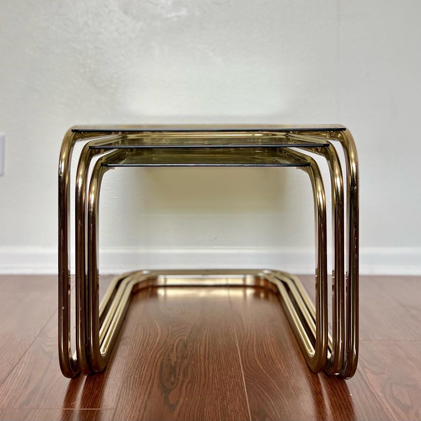 Late 20th Century Vintage Mid-Century Modern Brass Smoked Glass Nesting Tables by Milo Baughman