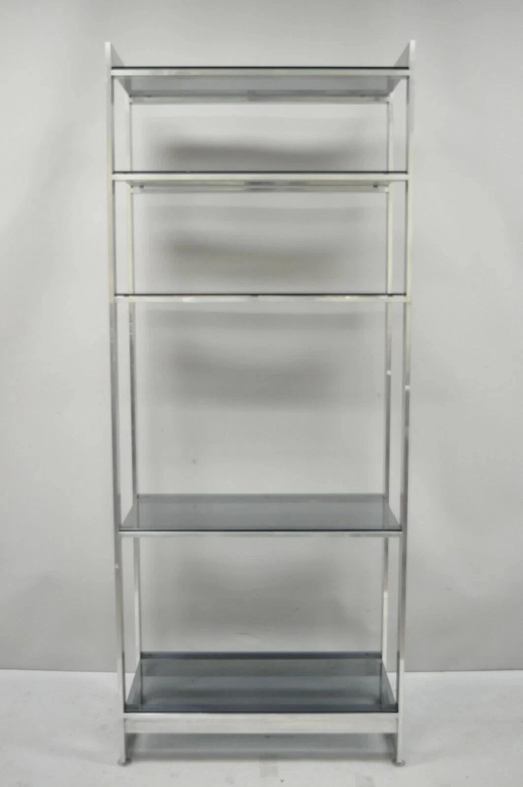 Vintage Mid Century Modern Brushed Aluminum Chrome Frame Etagere Display Shelf. Item features brushed aluminum metal frame, 5 smoked glass shelves, clean modernist lines. Circa Mid 20th Century. Measurements: 74.5