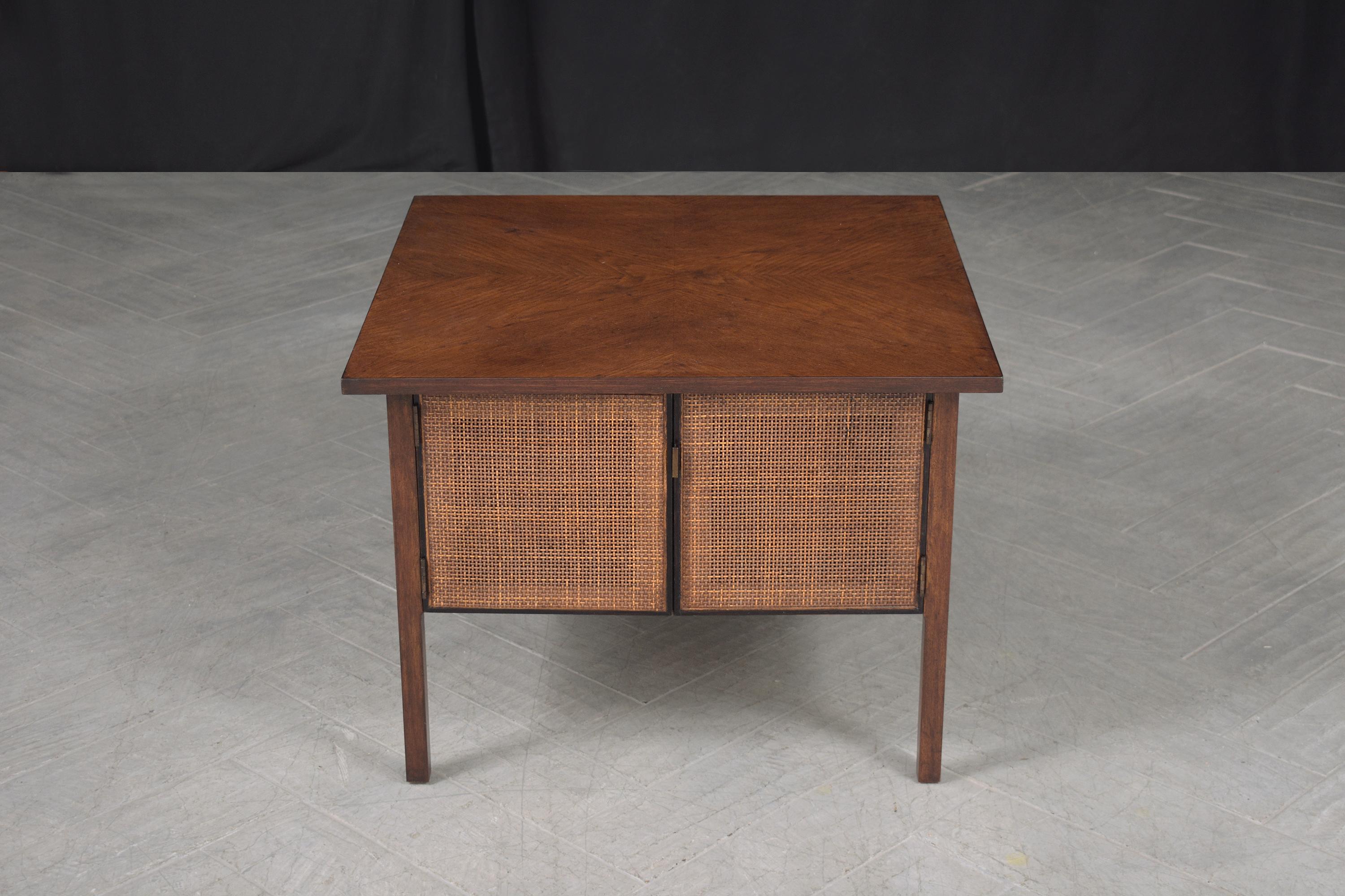 Explore this extraordinary Mid-Century Modern side table, impeccably hand-crafted from wood and meticulously restored by our expert in-house craftsmen. In great condition, this 1970s vintage piece boasts captivating features, including a dark walnut