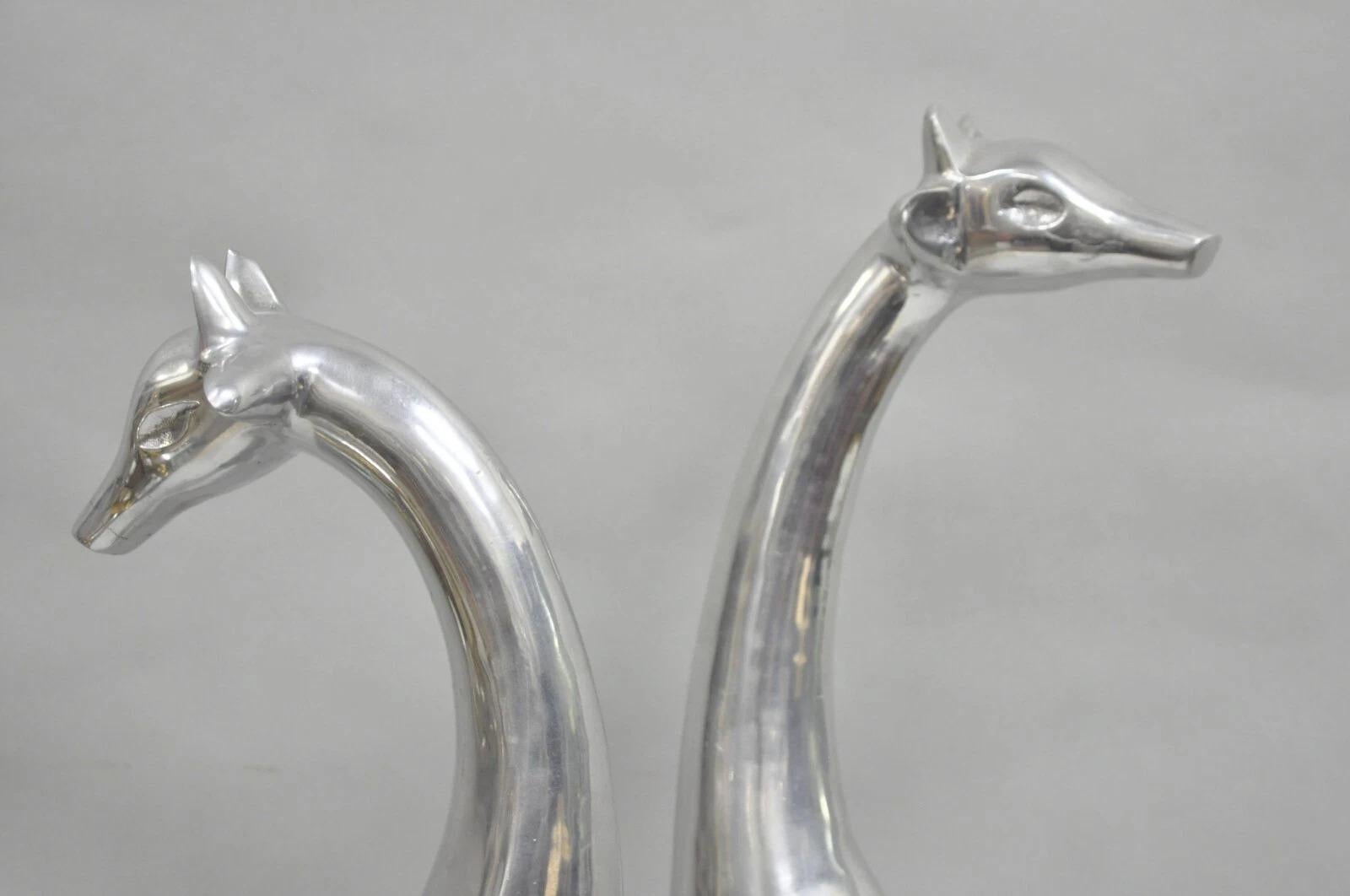 Mid-Century moderno Vintage Mid Century Modern Cast Aluminum Silver Giraffe Sculptures - a Pair in vendita