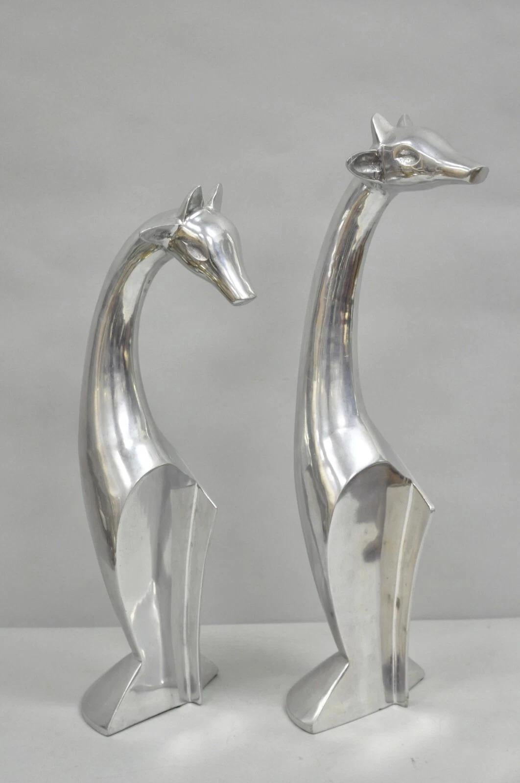 Sconosciuto Vintage Mid Century Modern Cast Aluminum Silver Giraffe Sculptures - a Pair in vendita