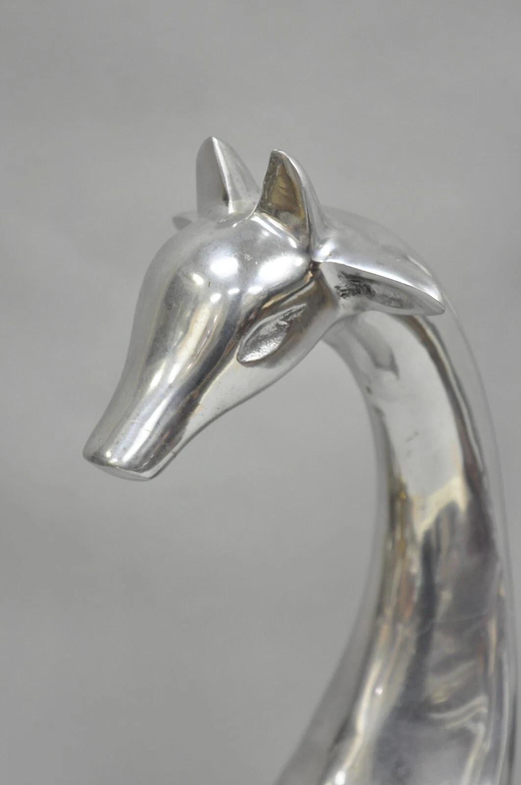Vintage Mid Century Modern Cast Aluminum Silver Giraffe Sculptures - a Pair In condizioni buone in vendita a Philadelphia, PA
