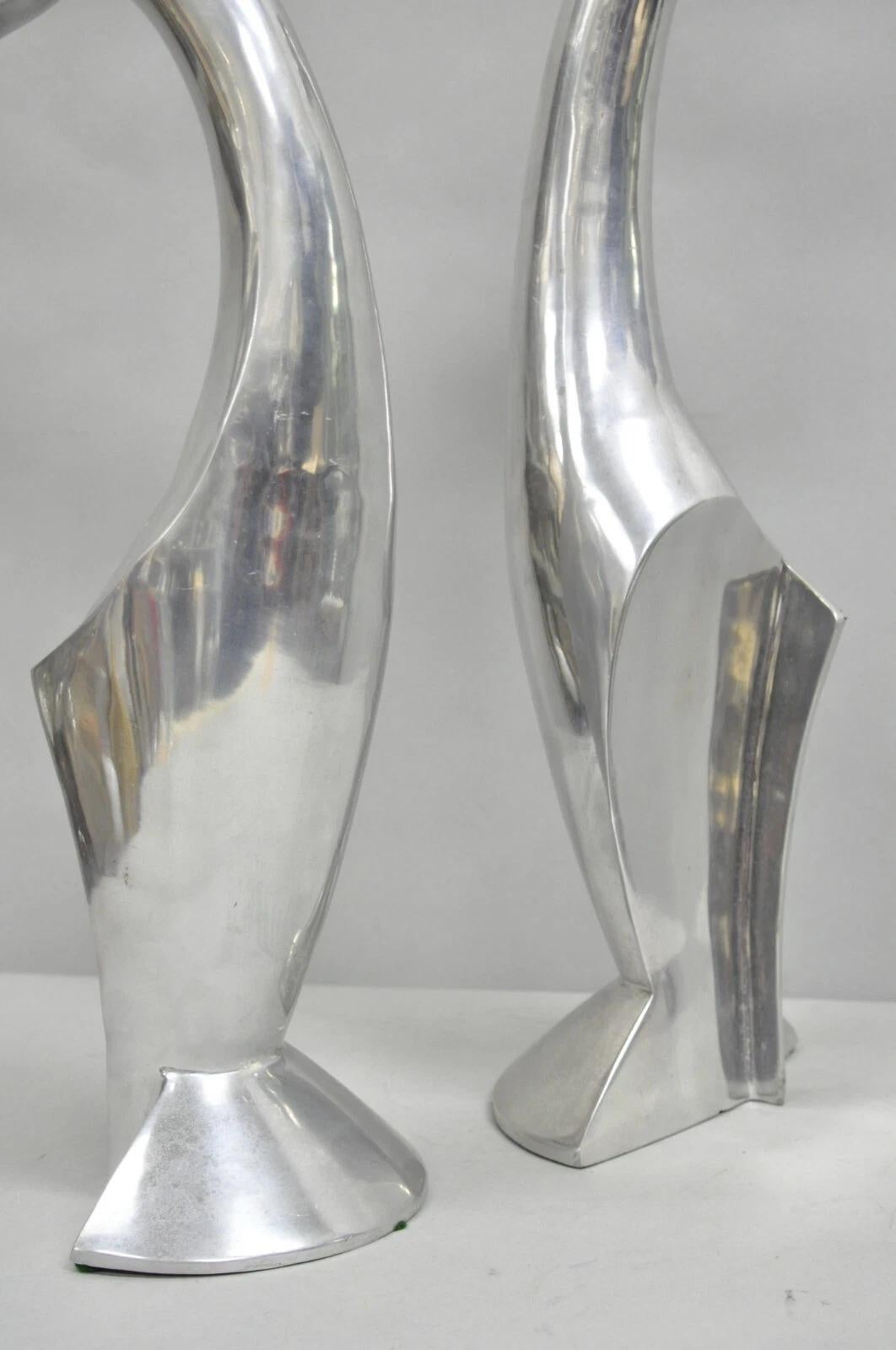 Alluminio Vintage Mid Century Modern Cast Aluminum Silver Giraffe Sculptures - a Pair in vendita