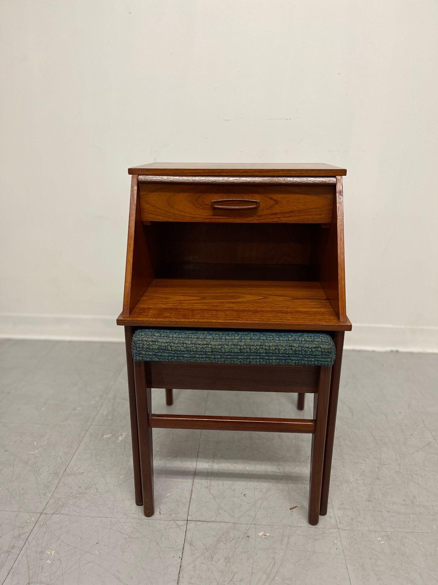 English Designer Chippy Telephone Seat with Blue Fabric Cushion. Wooden Handles on the Drawer, Classic Tapered Legs. Above the Drawer is a History Call List. Possibly Teak. Circa 1960s/1970s. Vintage Condition Consistent with Age as