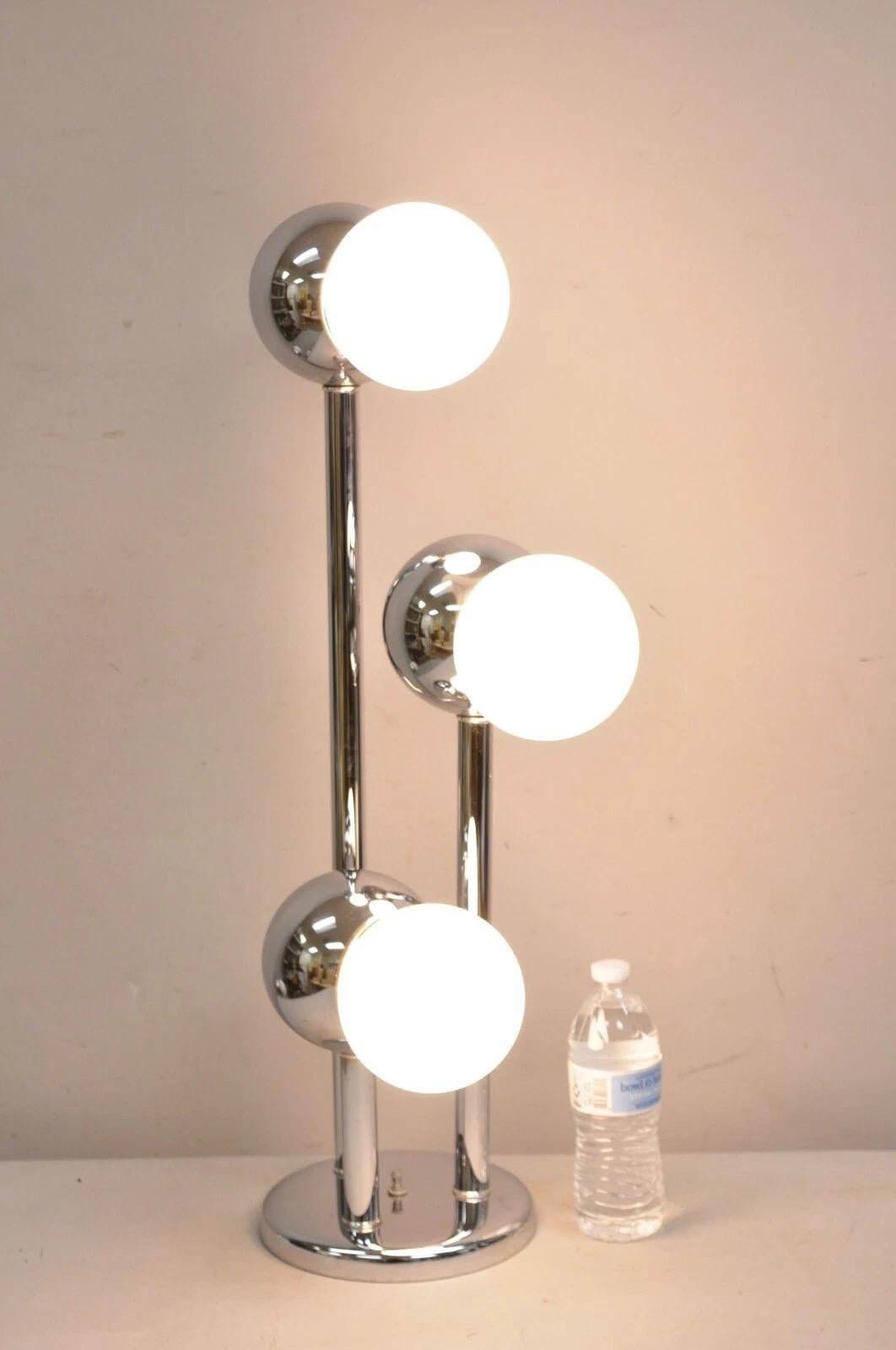 Vintage Mid Century Modern Chrome Ball Space AGE 3 Light Table Lamp After Robert Sonneman - a Pair. Circa Mid 20th Century. Dimensions : 29