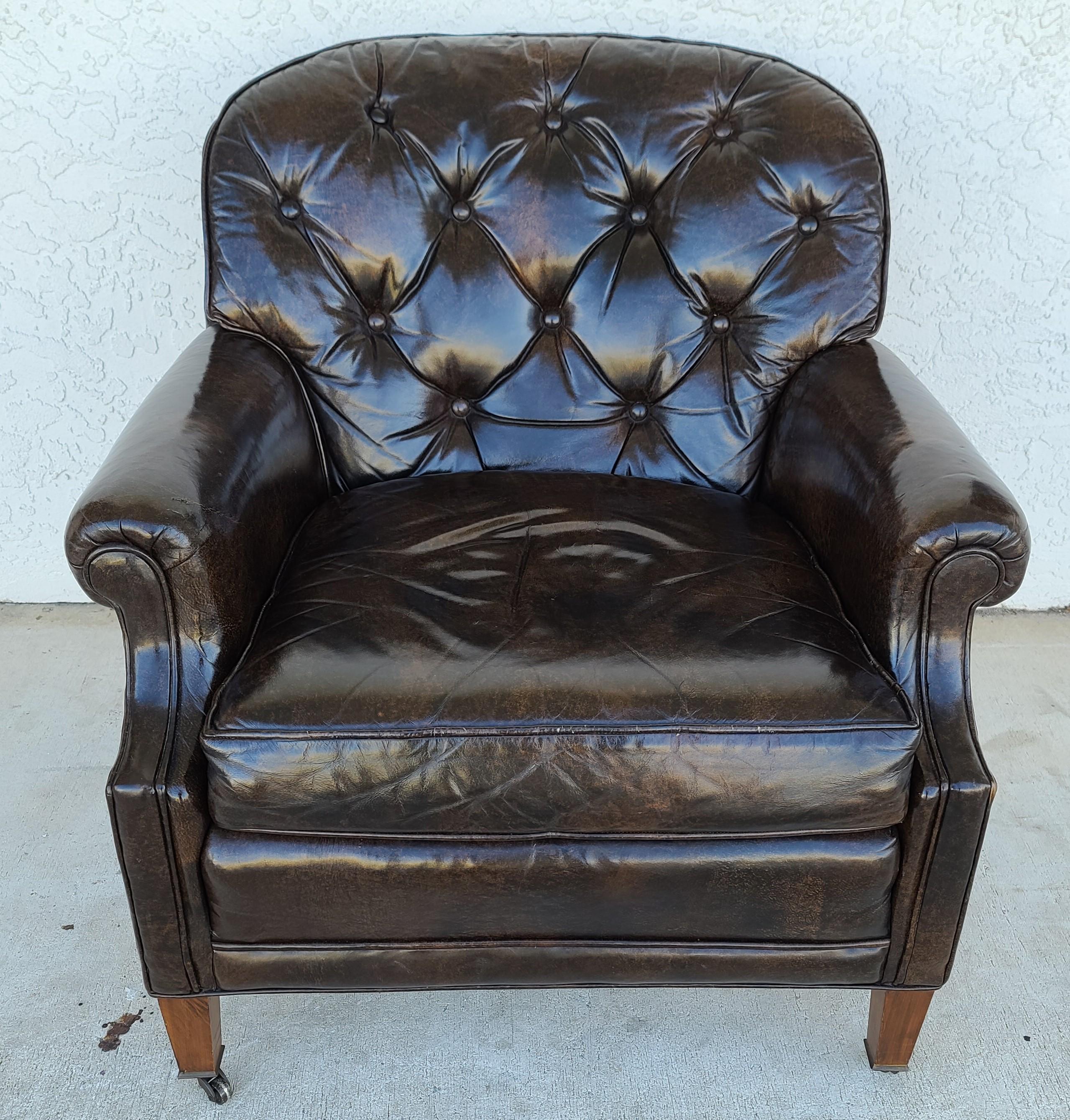 Offering one of our recent palm beach estate fine furniture acquisitions of a
Vintage Mid Century Modern classic porters of Racine tufted leather lounge chair
In dark brown with front brass casters.

Approximate Measurements in Inches
32