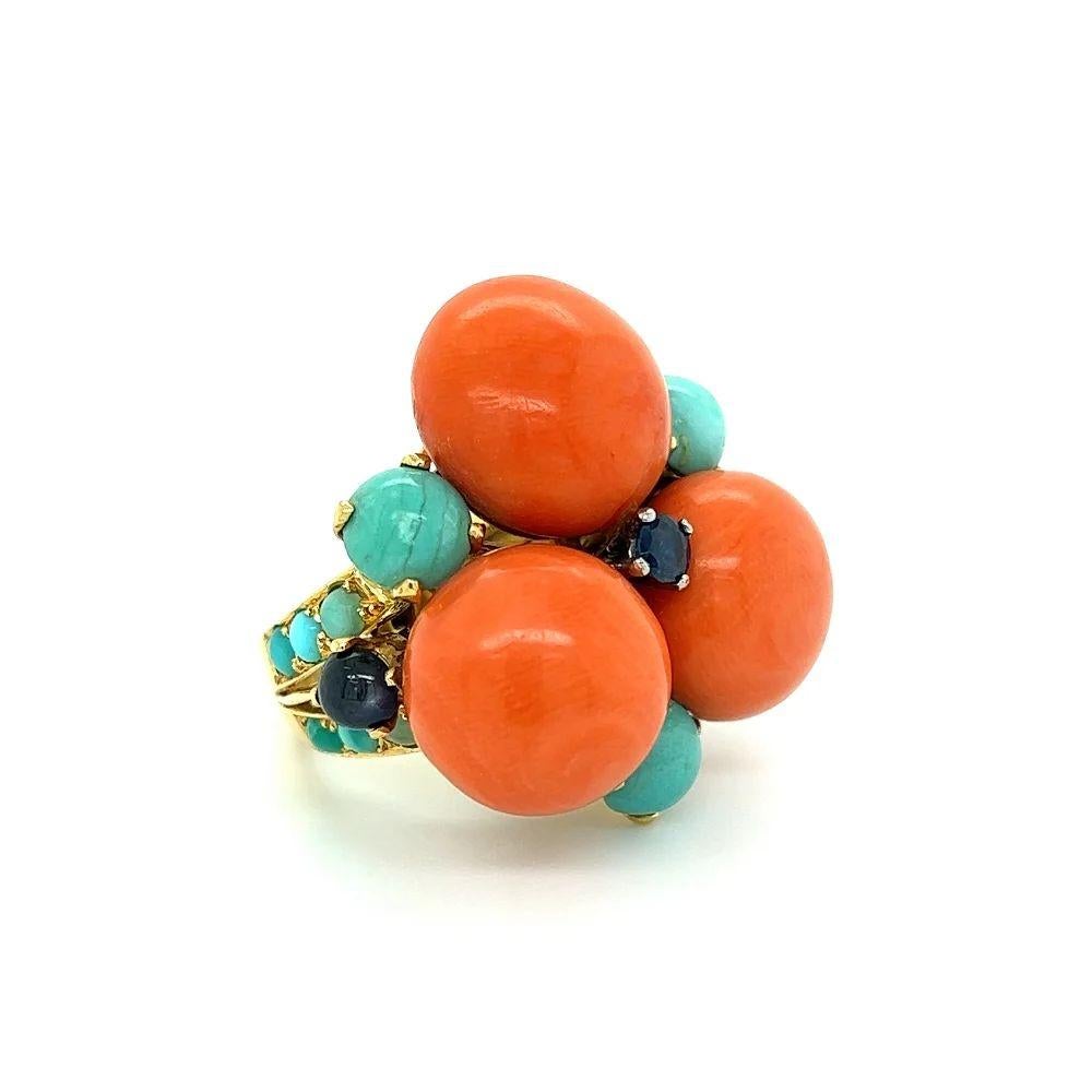 Simply Beautiful! Finely detailed Vintage Mid Century Modern Red Coral Turquoise and Sapphire Gold Cluster Ring. Hand set with 3 Round Coral, weighing approx. 21.0tcw, and Sapphires, approx. 1.0tcw, accented by Turquoise. Hand crafted 18K Yellow