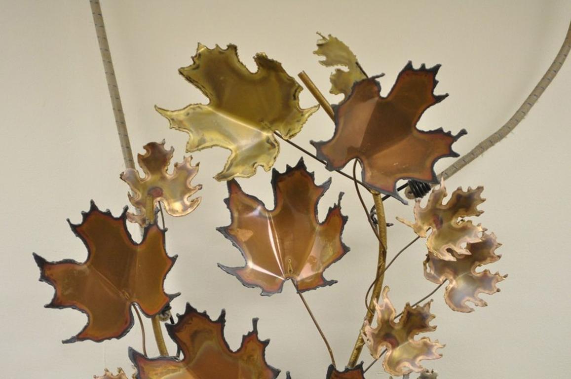 Vintage Mid-Century Modern maple leaf metal wall sculpture by Curtis Jere (Signed on Leaf), circa 1971. Measurements: 46