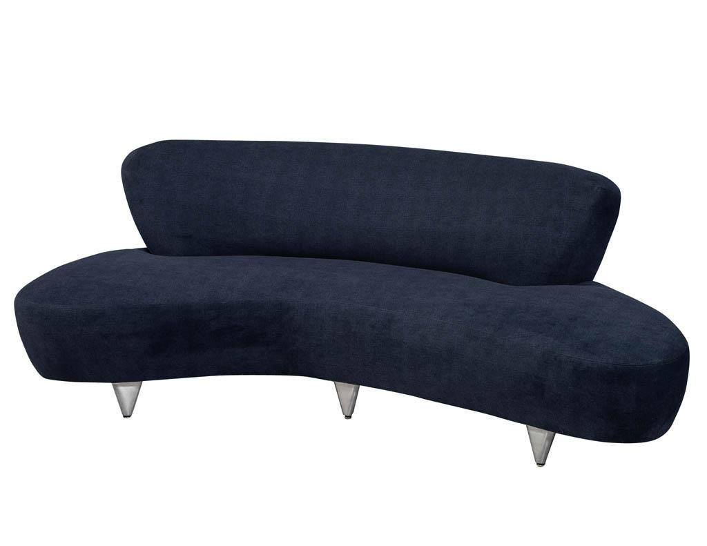 Vintage Mid-Century Modern curved sofa. Graceful and sleek curved and contoured design upholstered in Maxwell – Baxter ESS #800 Navy with a top stitch, perched atop brushed steel legs. Iconic Mid-Century Modern design circa 1960s fully restored.

 