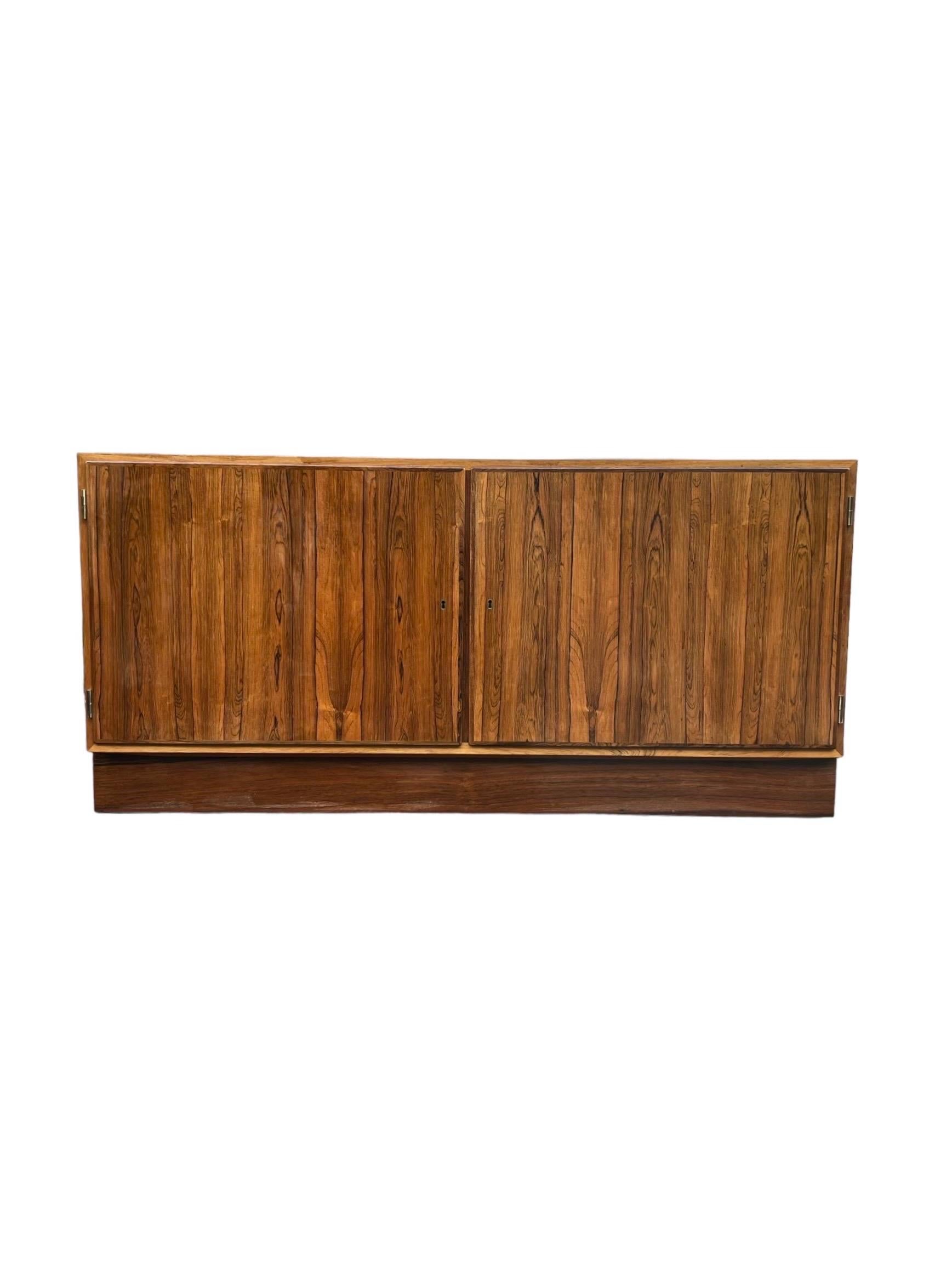 Vintage Mid Century Modern Danish Credenza Console , Side Board by Hundevad with Key

Dimensions. 54 W ; 17 D ; 27 H