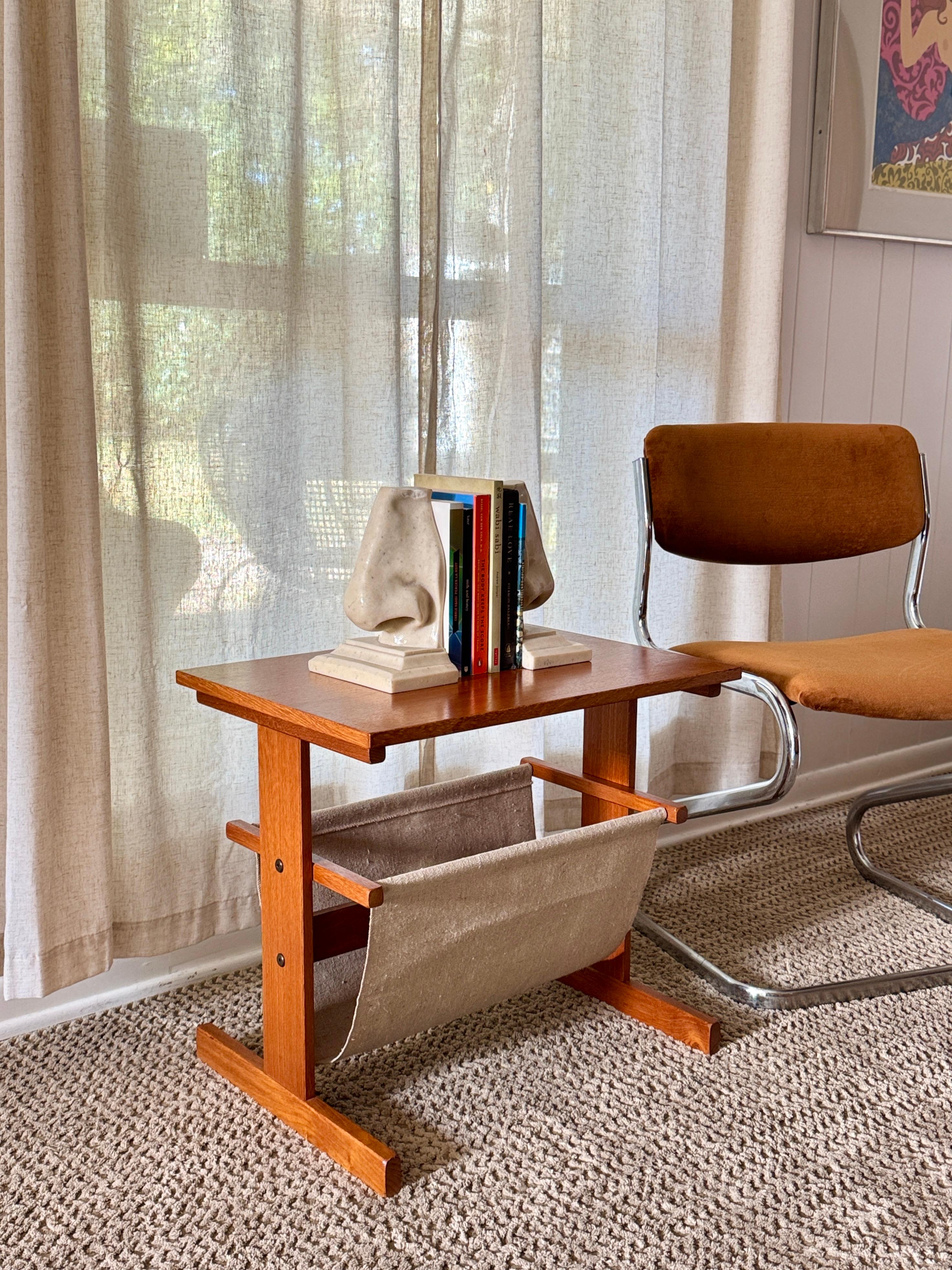 Mid-20th Century Vintage mid century modern Danish magazine table made of teak and canvas For Sale