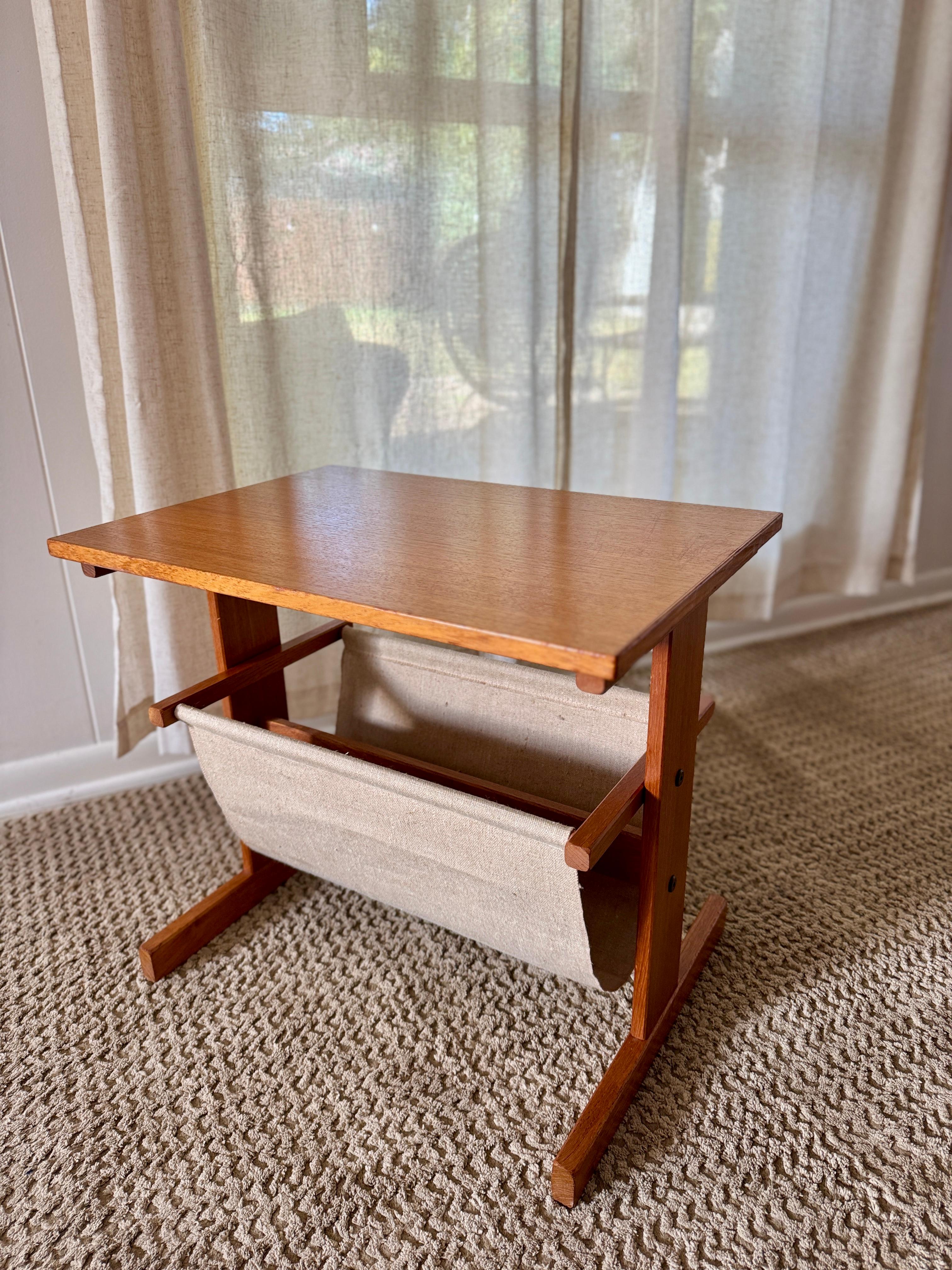 Vintage mid century modern Danish magazine table made of teak and canvas For Sale 3