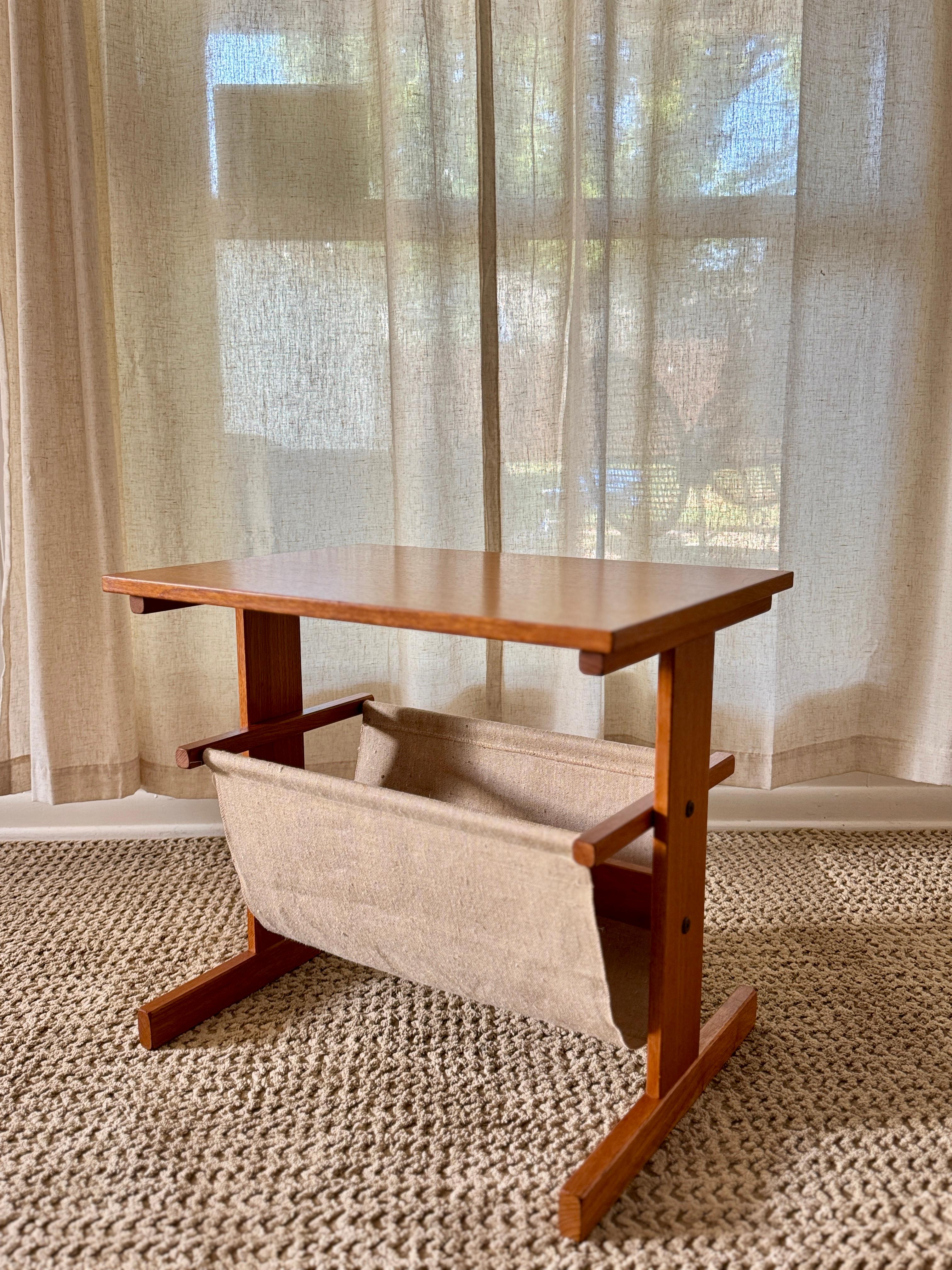 Vintage mid century modern Danish magazine table made of teak and canvas For Sale 4