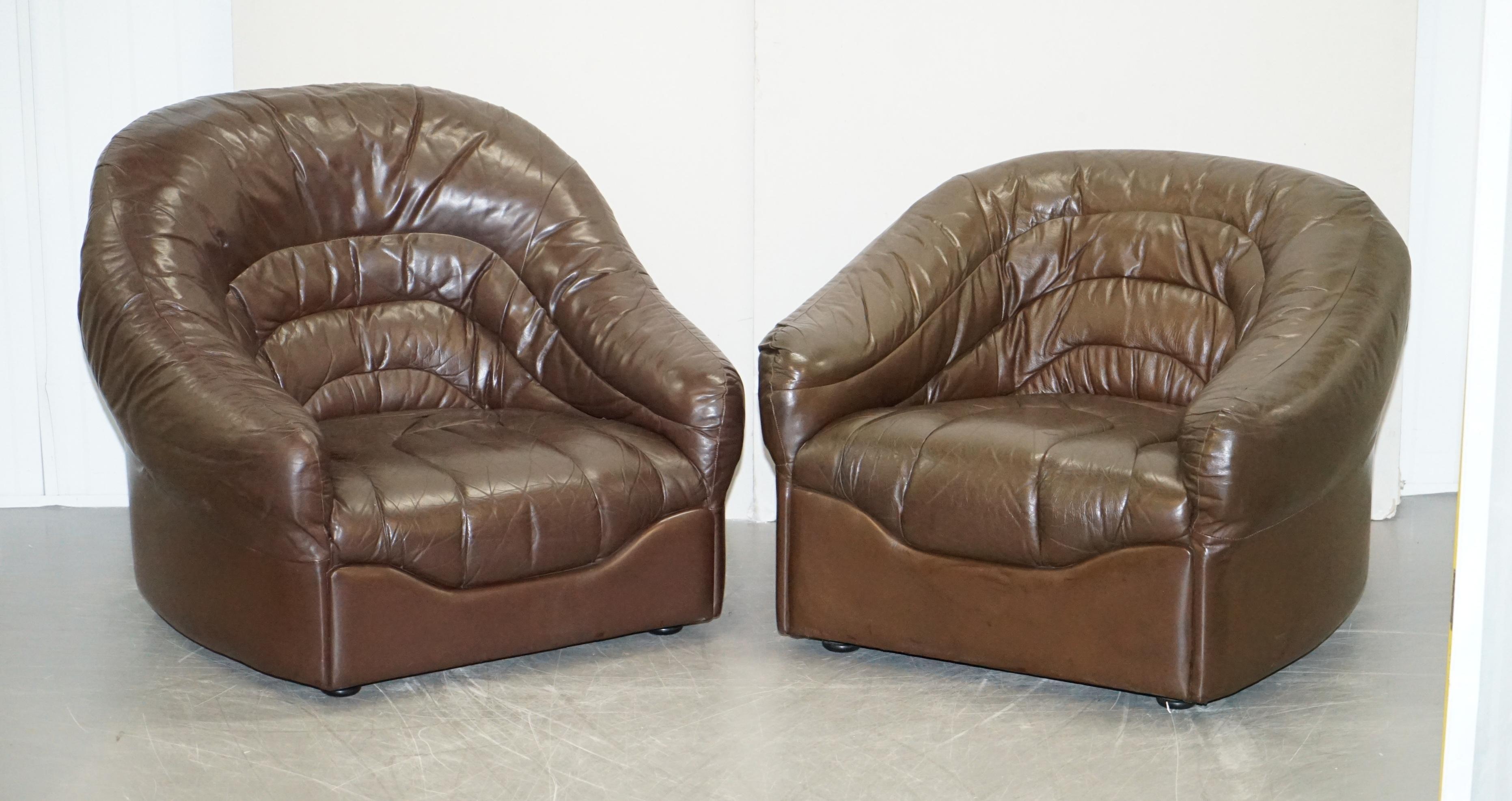 We are delighted to offer for sale this lovely vintage Mid-Century Modern suite of two his and hers armchairs with matching sofa in the Danish style

These are typical of Danish style leather seating, thick brown leather that’s super soft, dyed