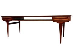 Vintage Mid Century Modern Danish Style Coffee Table with Sculpted Drawer Pulls.