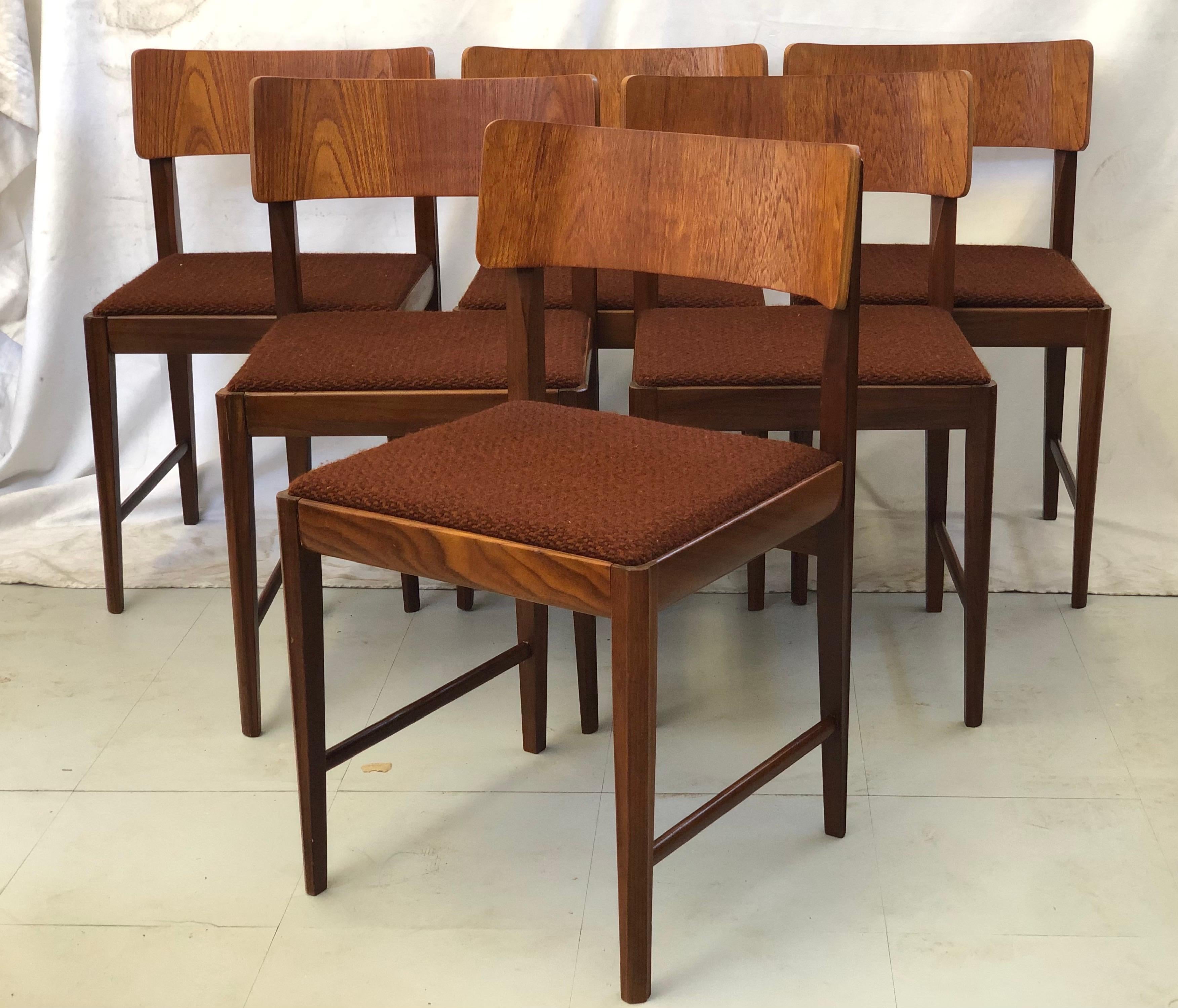Set of Six Mid-Century Modern Danish Style walnut dining chairs, 1960s. The chairs having a bentwood backrest and gently tapering legs joined by a pair of side stretchers. The chairs have original mid-century style fabric.