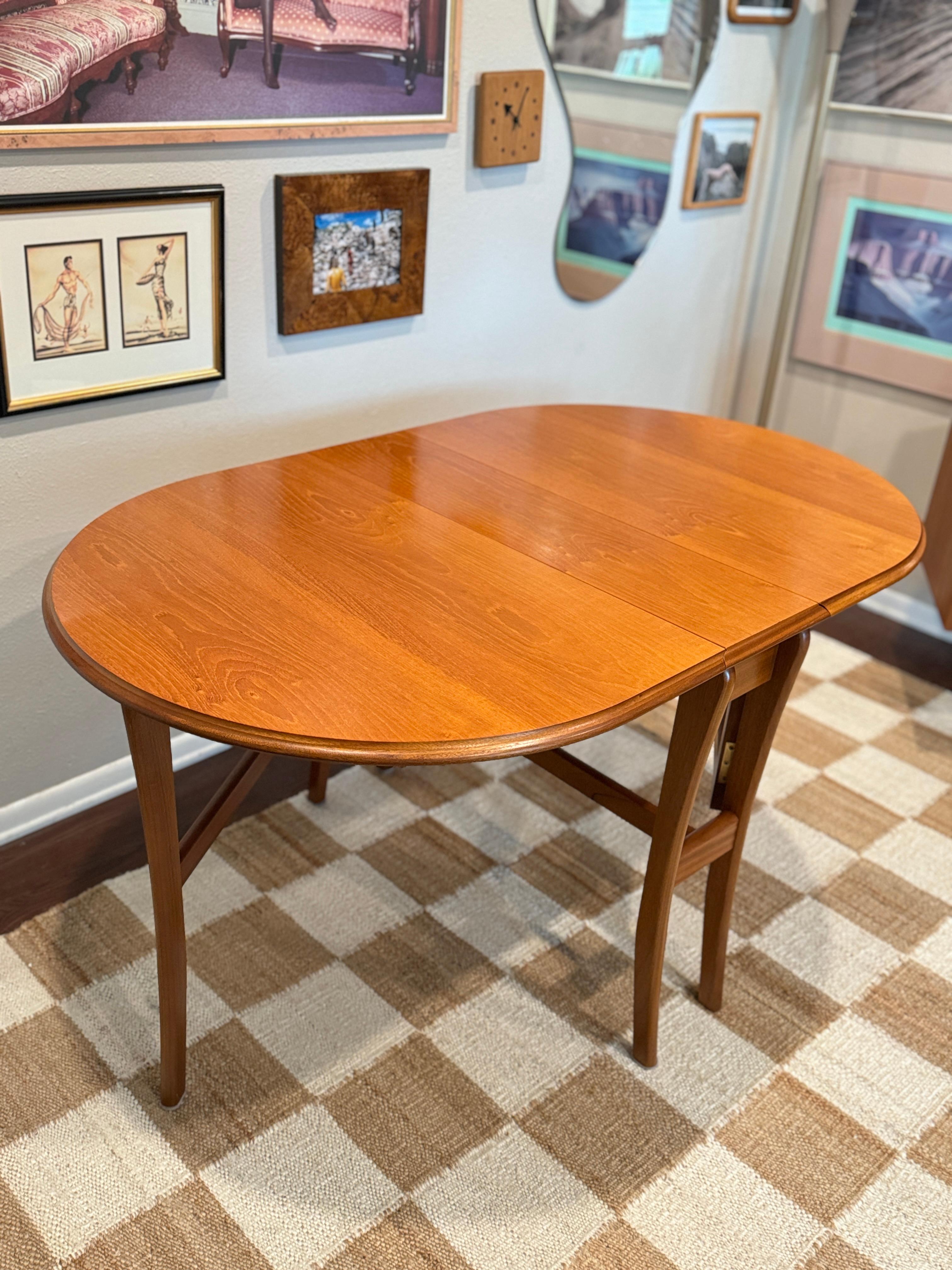 Mid-Century Modern Vintage mid century modern dining set including a drop leaf table and 4 chairs