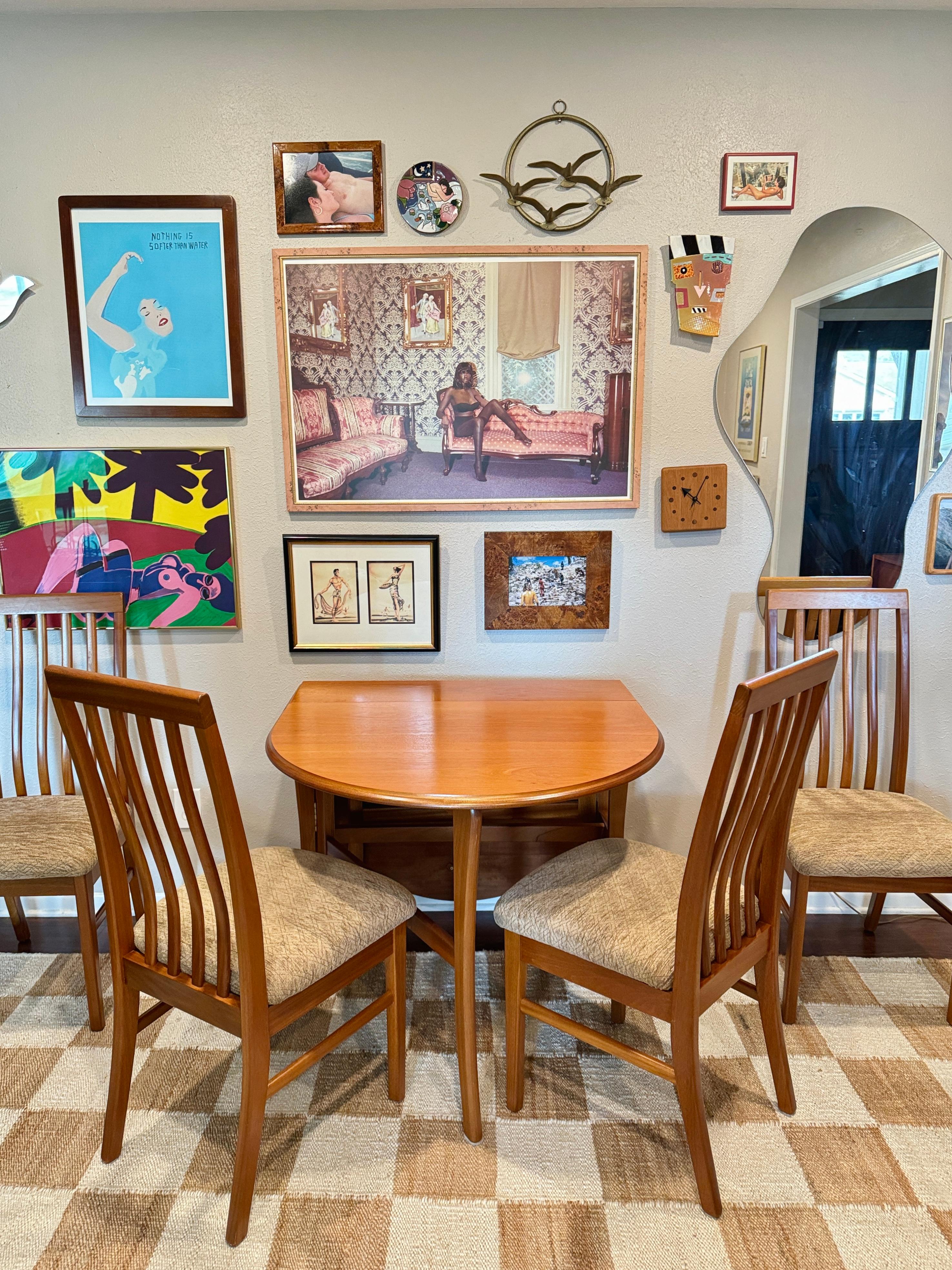 Mid-20th Century Vintage mid century modern dining set including a drop leaf table and 4 chairs