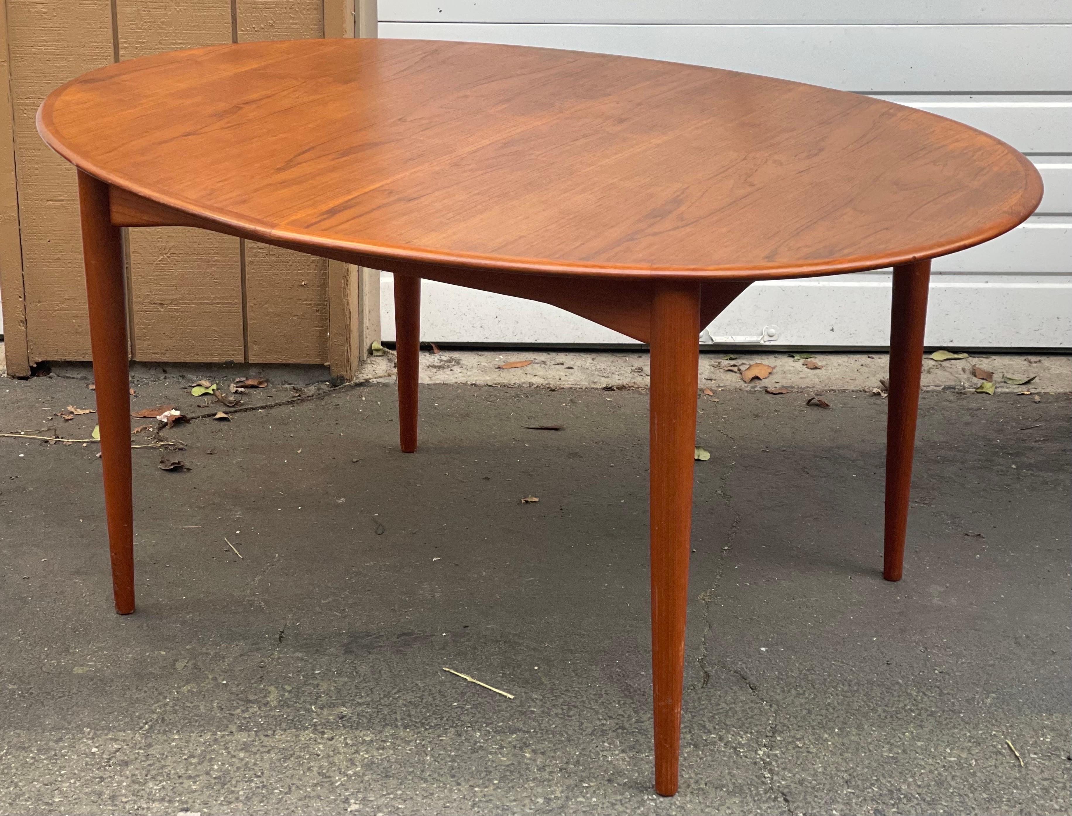 (Available by Online Purchase Only)

Vintage Mid Century Modern Dining Table. UK Import
( No Leaf )
Dimensions. 56 1/2 W ; 41 1/2 D ; 28 H