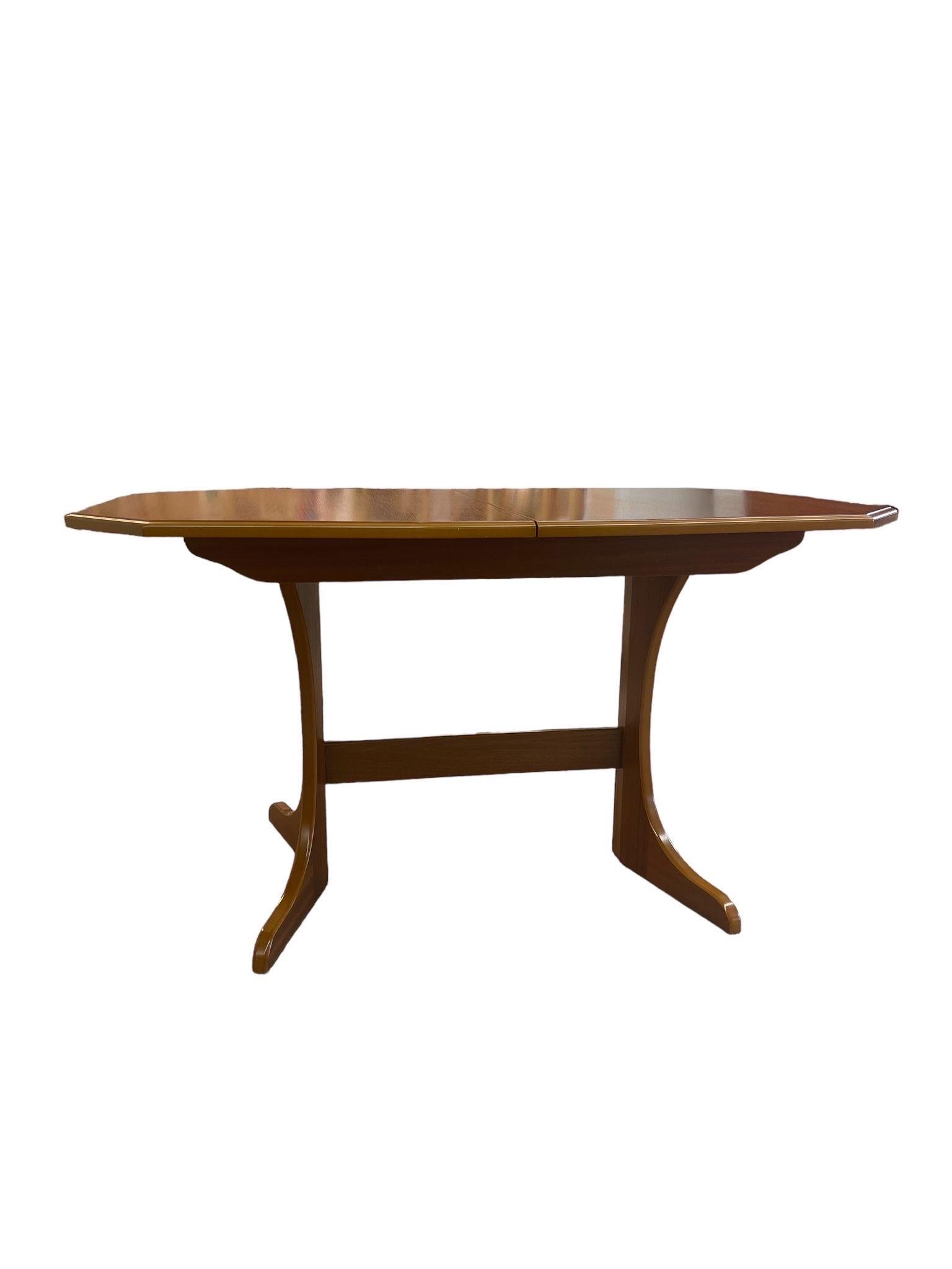 Vintage Dining Table with Original Finishes and Bevelled Edges. Mid Century Modern Lines Throughout. Insert has a “ Made in Germany “ as Pictured.

Dimensions. 55 W ; 33 1/2 D ; 30 H
Inserted . 35 1/2 W ; 15 D