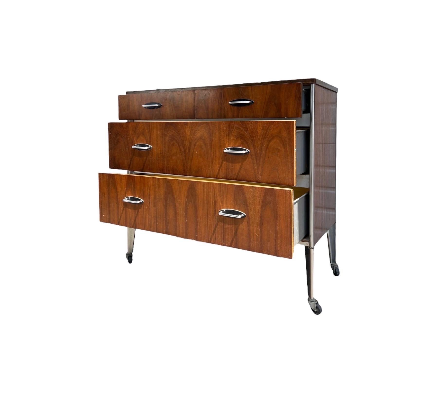 Wood Vintage Mid Century Modern Dresser By Raymond Loewy For Hill Rom Walnut Casters  For Sale