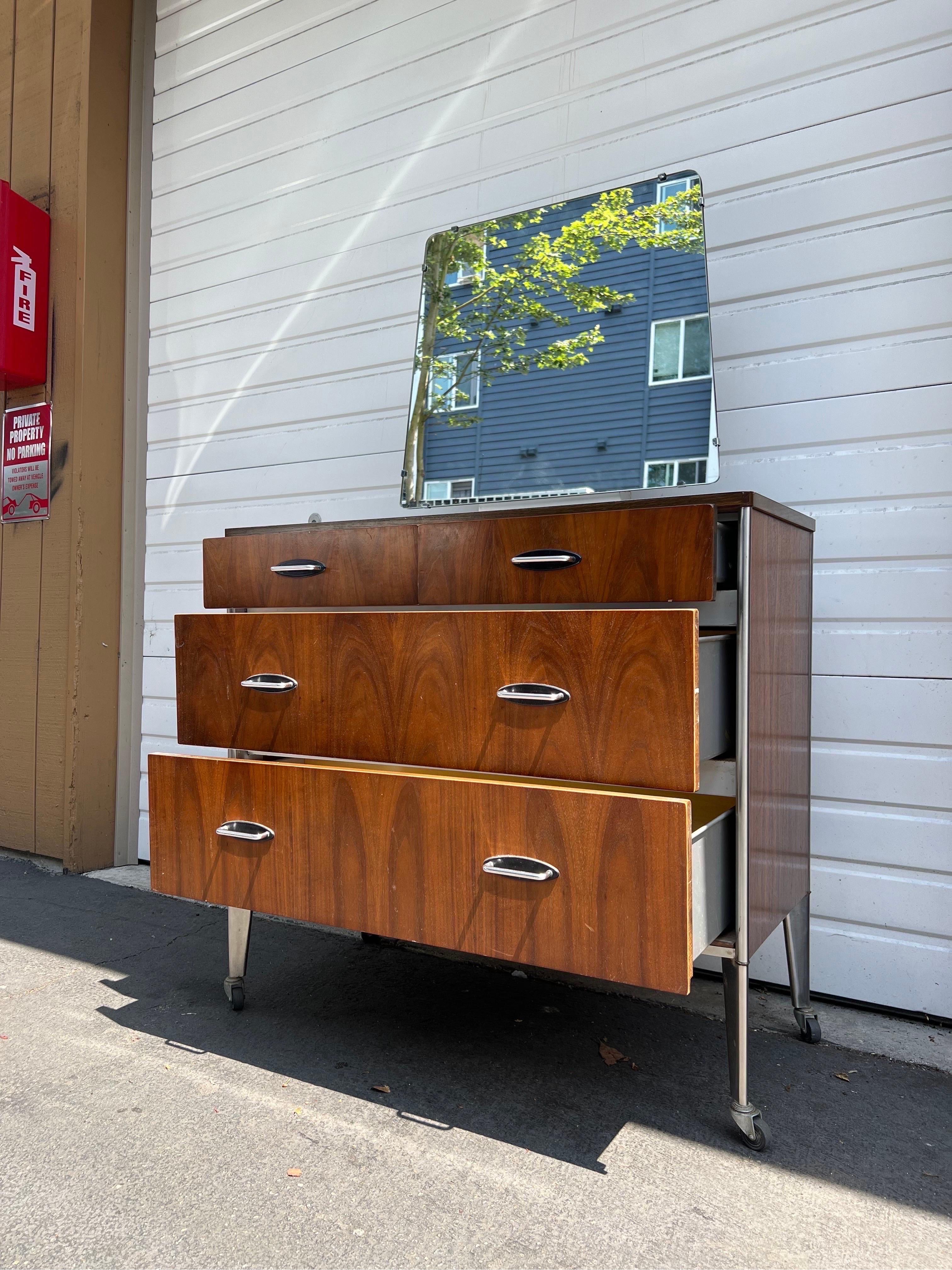 Vintage Mid Century Modern Dresser By Raymond Loewy For Hill Rom Walnut Casters  For Sale 1