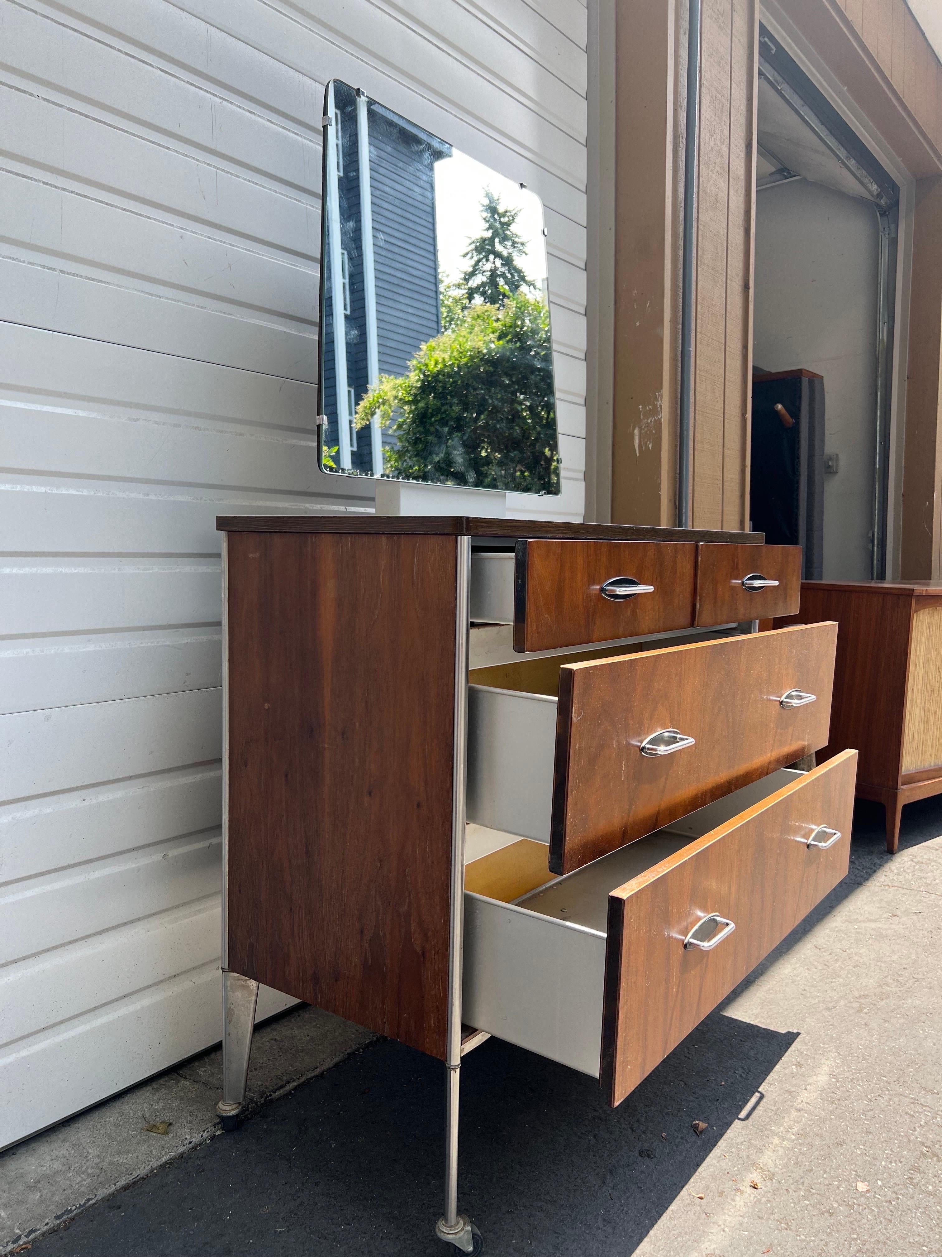 Vintage Mid Century Modern Dresser By Raymond Loewy For Hill Rom Walnut Casters  For Sale 2