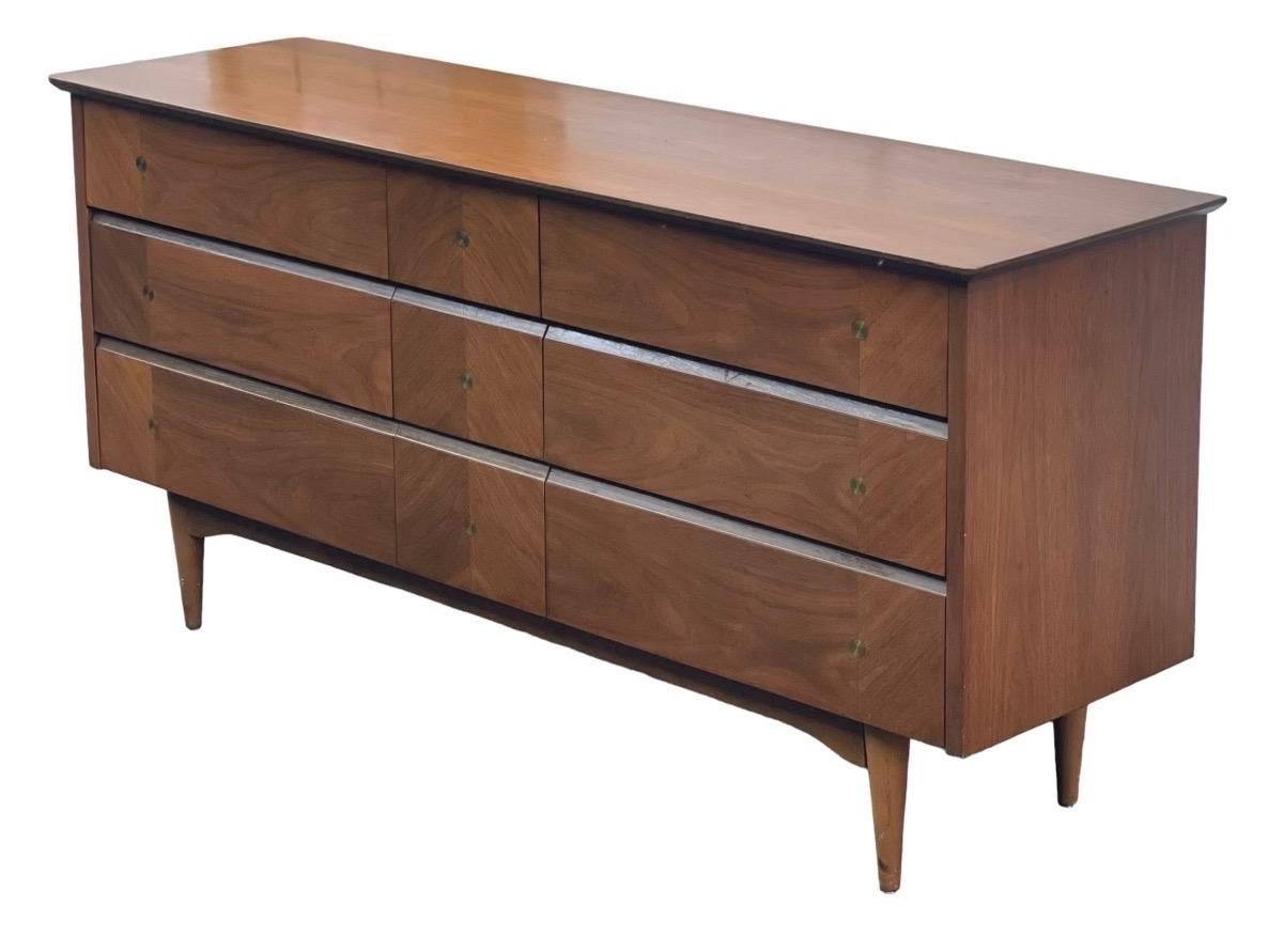 Vintage Mid-Century Modern Dresser Set. Dovetail Drawers.

Dimensions. Tall Boy. 34 W ; 18 D ; 42 H

 Low Boy. 64 W 18 D ; 31 H.