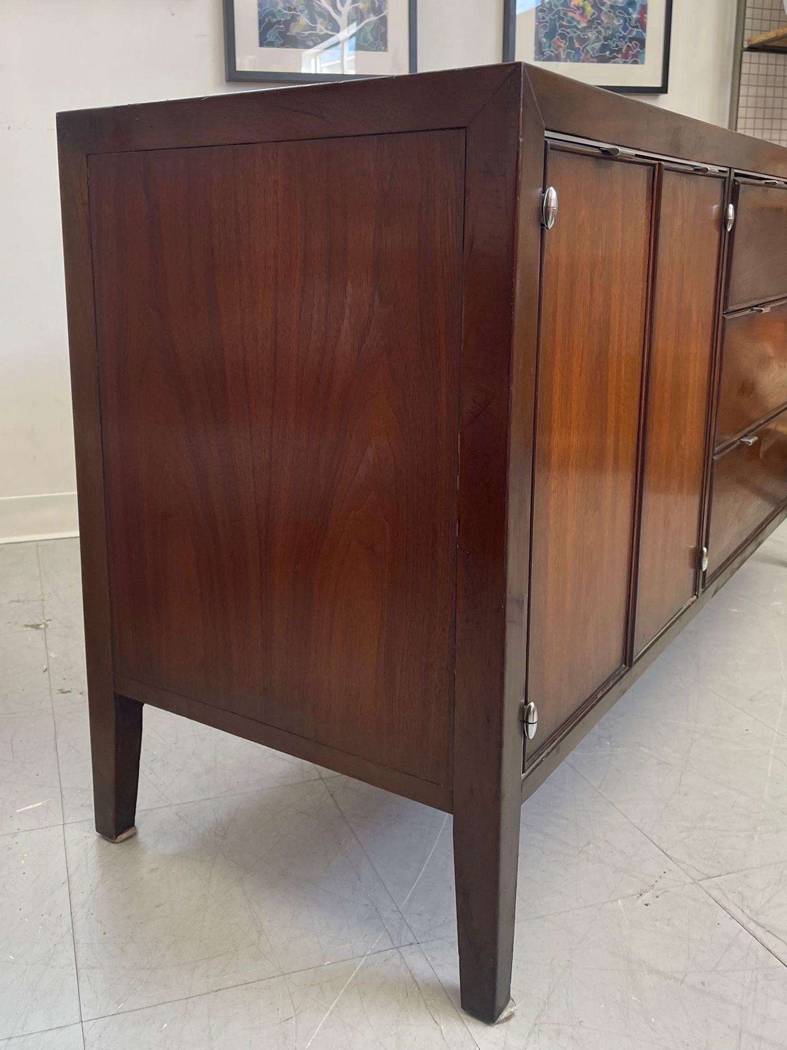 Vintage Mid Century Modern Drexel Credenza Cabinet With Chrome Toned Hardware. In Good Condition For Sale In Seattle, WA