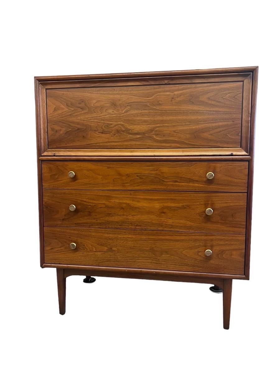 Vintage Mid Century Modern Drexel Declaration Dresser Set . Sold Walnut

Dimensions. Lowboy. 66 W ; 30 D ; 32 H
                    Highboy. 38 W ; 20 D ; 45 H
