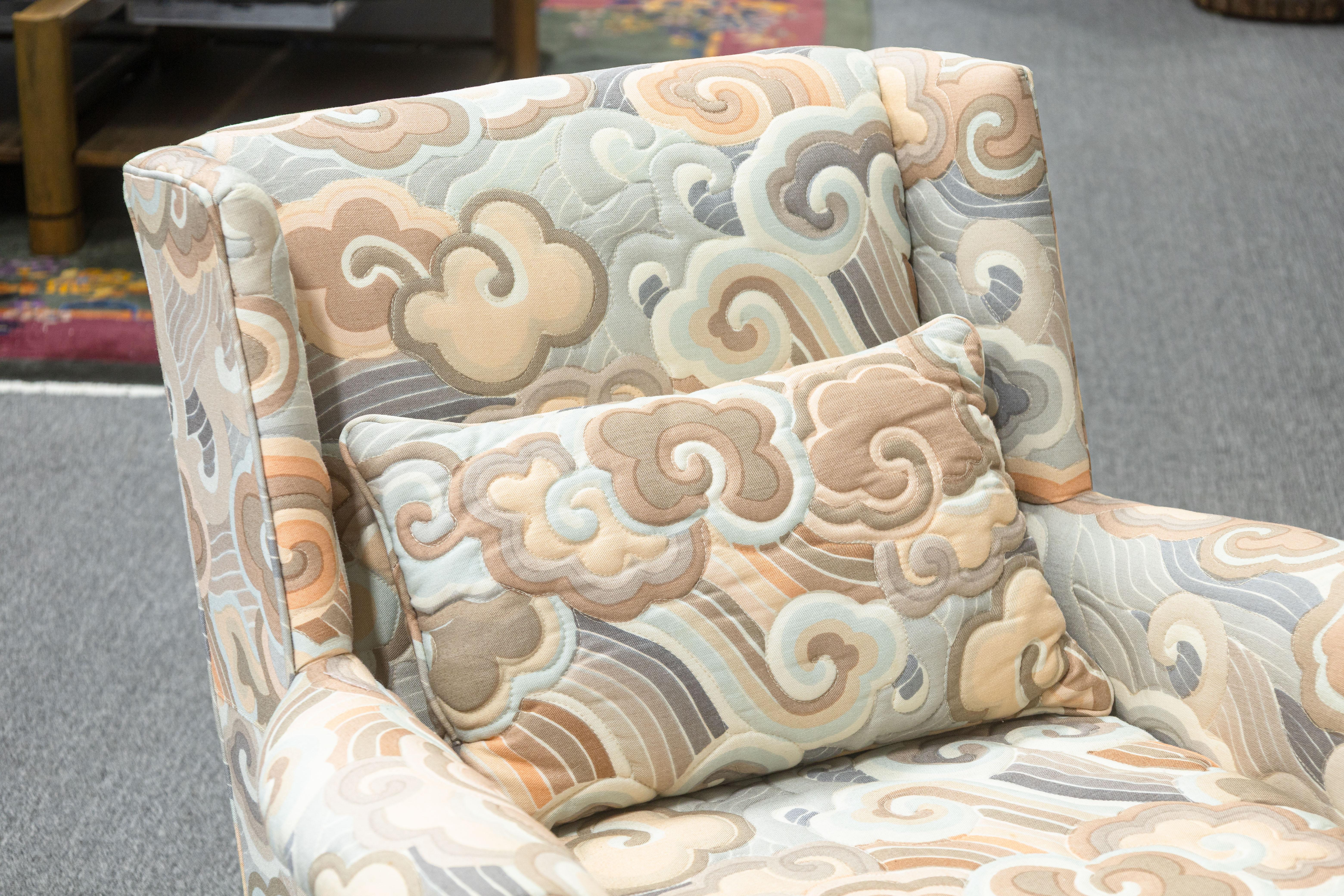 A vintage mid century Erwin Lambeth armchair and ottoman. This is a lovely lounge set featuring a very comfy armchair and matching ottoman footstool to go with it. Each item is upholstered in a very cool custom swirling cloud-like design with