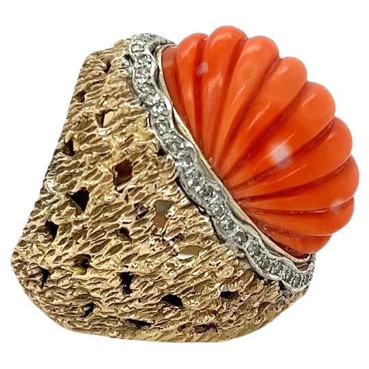Simply Beautiful! Finely detailed Fluted Oval Red Coral and Diamond Vintage Cocktail Ring. Centering a securely nestled Hand set Awesome Fluted Oval Red Coral, accented by Diamonds, weighing approx. 0.40tcw. Hand crafted 14K Yellow Gold mounting.