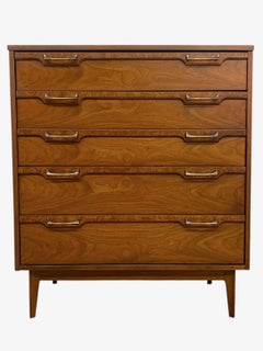 Vintage Mid Century Modern Four Drawer Dresser with Sculpted Drawer Fronts.
