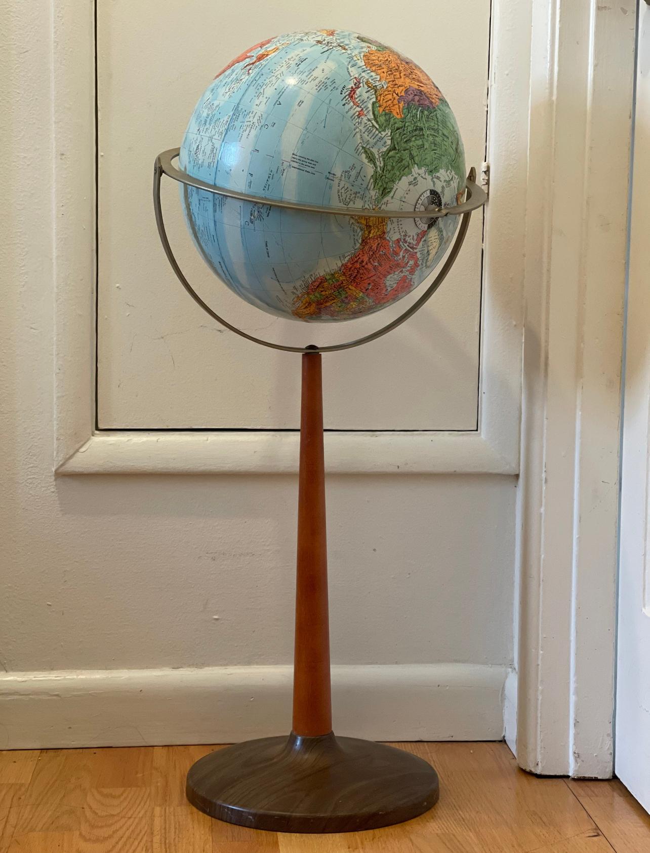 World Ocean globe rising on a Mid-Century Modern Art deco stand, 14in Diameter 33