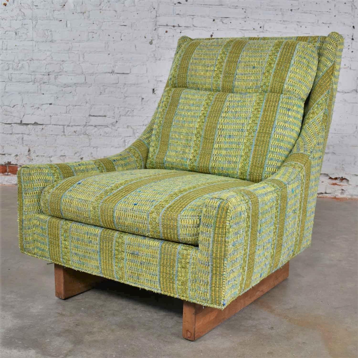 Handsome blue and green Mid-Century Modern high back lounge chair from the Flair Division of Bernhardt Furniture. It is in wonderful vintage condition. Its original fabric has been professionally cleaned and there are no holes or tears; however, you