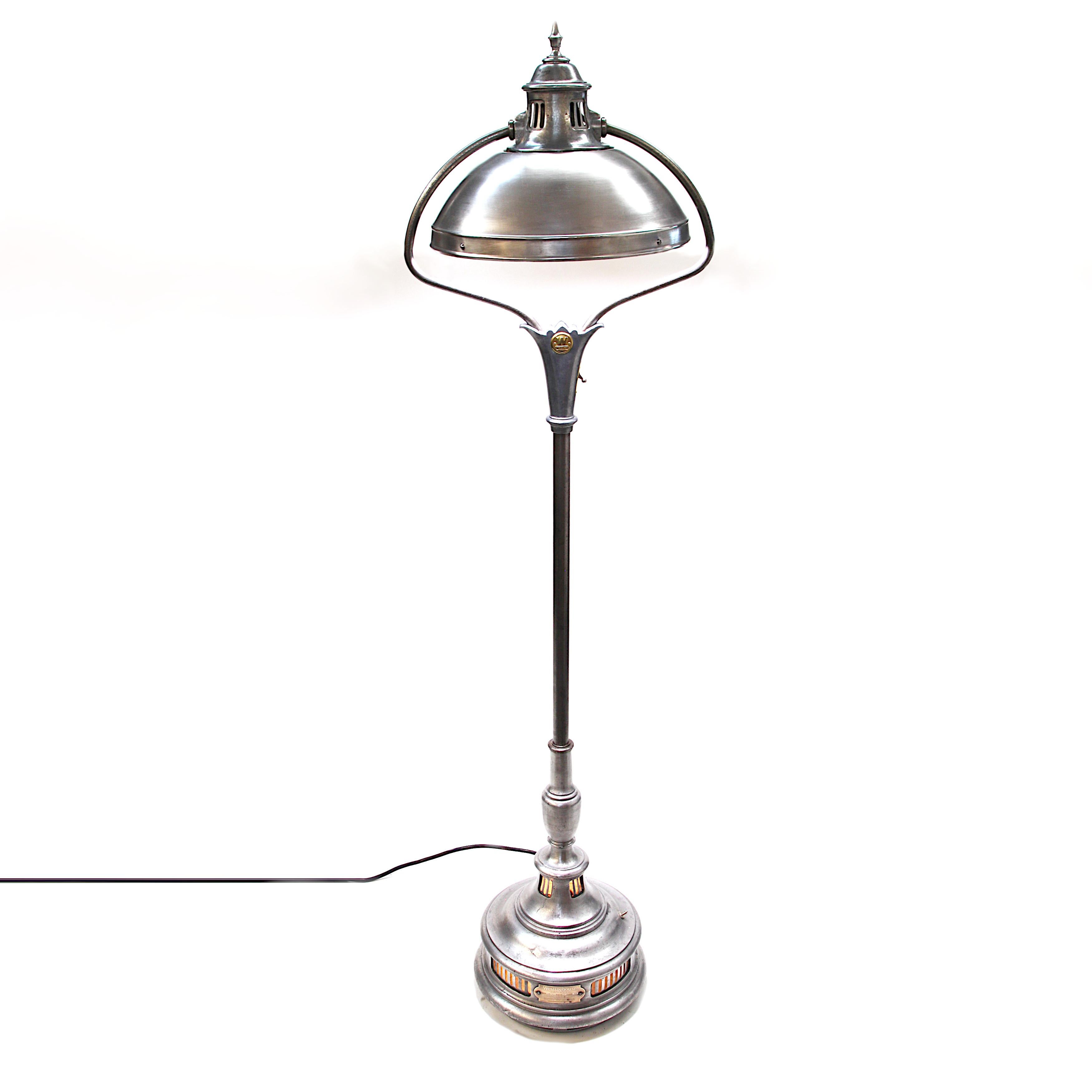 This rare and wonderful floor lamp began life as a 1930s GE Sunlamp, a device that claimed no true therapeutic or medical benefits but stated its purpose as a rather questionable 
