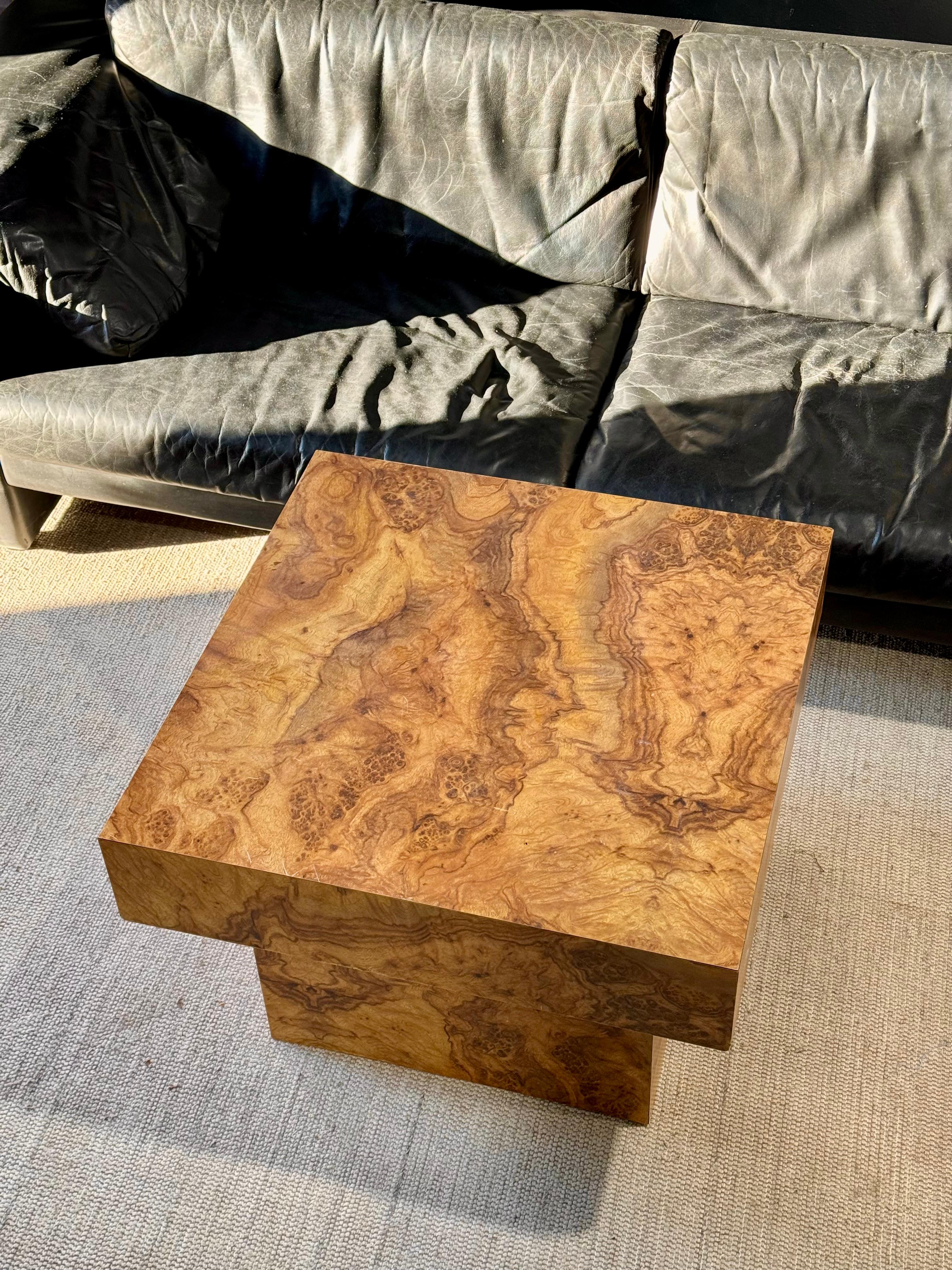 Mesmerizing vintage 1960’s burlwood plinth style coffee table. Fabulous to behold, with dynamic texture play between the sharp corners & organic wood grain. 

Incredible burl laminate mounted to a clean block silhouette. In good vintage condition,