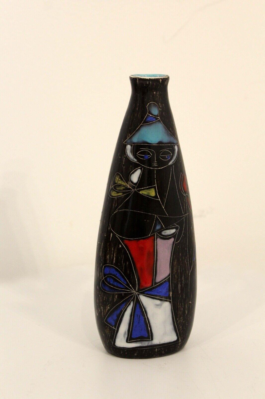 For your consideration is this iconic mid century studio ceramic vase made and signed by Marcello Fantoni. Dimensions: 3w x 2d x 8.25h.
 