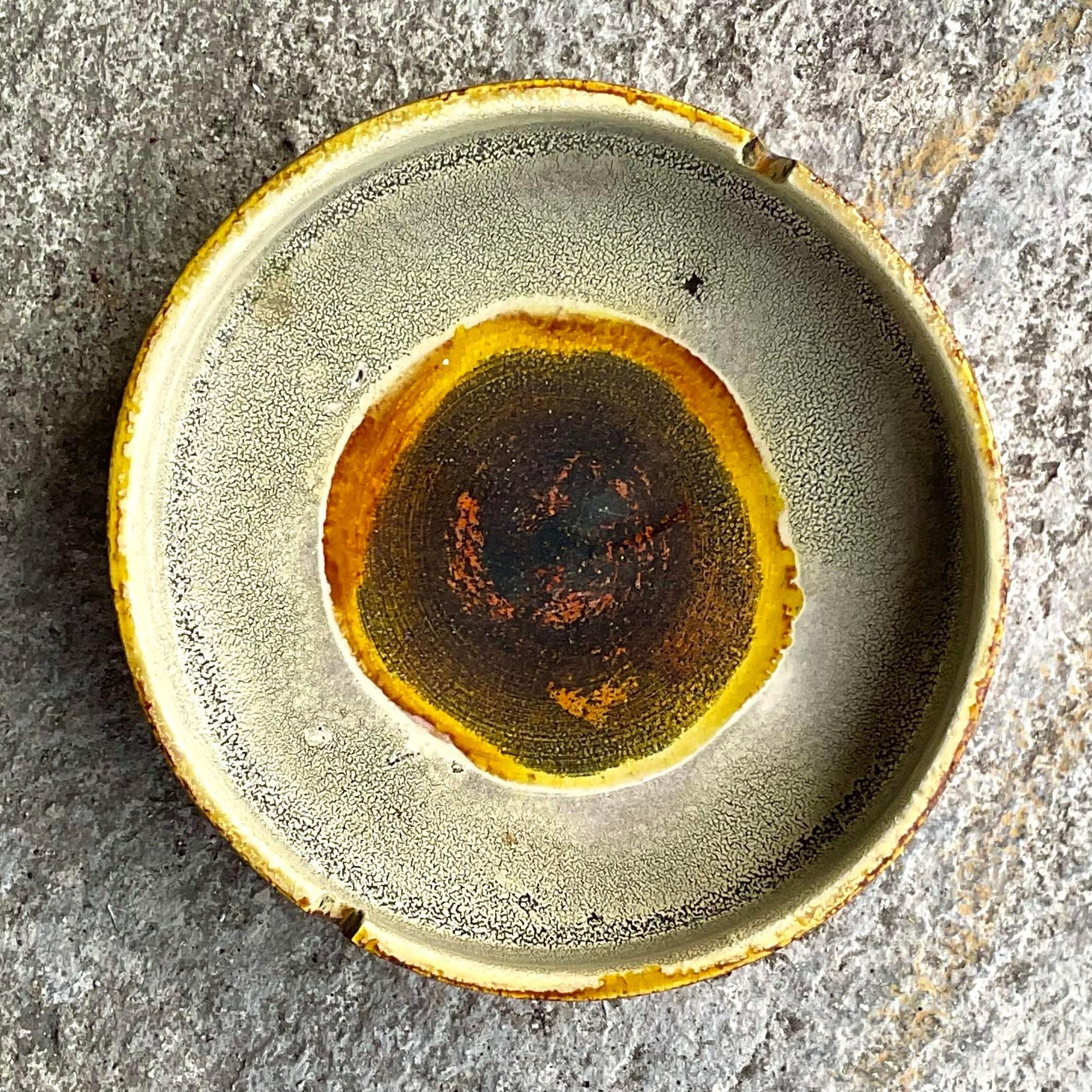 A fantastic vintage MCM ashtray. Made by the iconic Marcello Fantoni and signed on the bottom. Beautiful warm colors in an Abstract composition. Acquired from a Palm Beach estate.