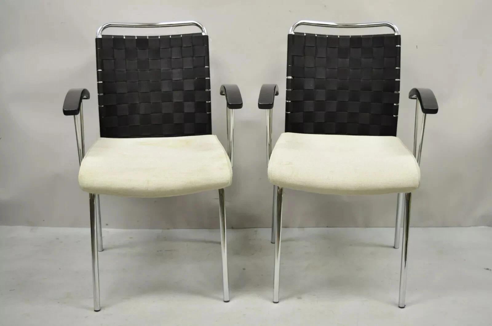 Vintage Mid Century Modern Italian Woven Back Chrome Frame Arm Chairs - a Pair. Item features woven fabric backs, solid wood armrests, upholstered seat, chrome metal steel frame, clean modernist lines. Circa Late 20th Century. Measurements: 34.5