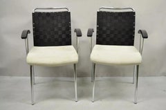 Poltroncine vintage con schienale intrecciato e struttura in cromo della metà del secolo scorso - una coppia