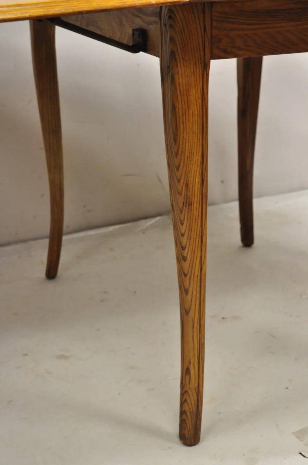 Mid-Century Modern Vintage Mid Century Modern Klismos Saber Leg Oak Drop Leaf Dining Table For Sale