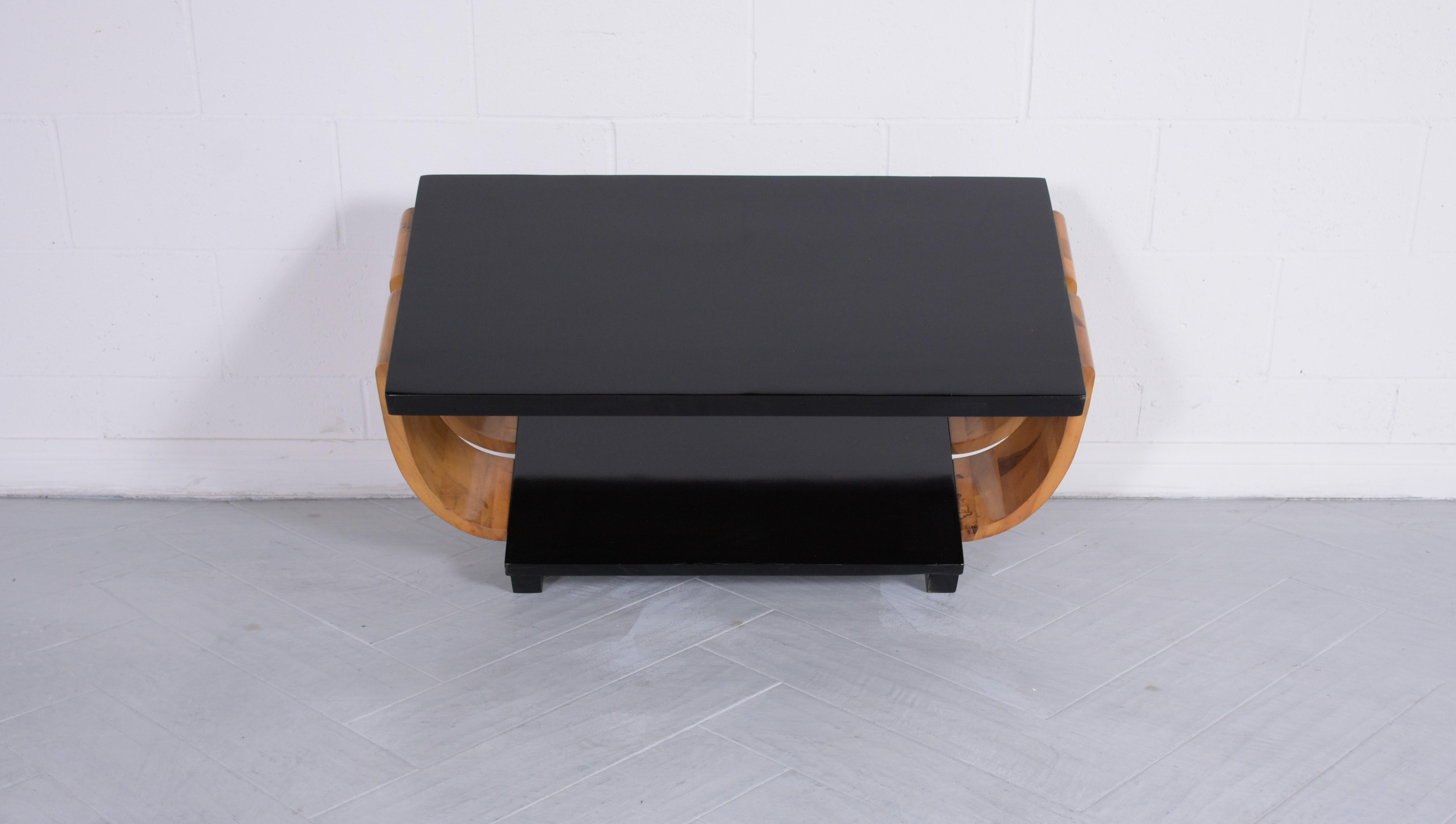 Introducing our exceptional Vintage Mid-Century Modern Coffee Table, beautifully restored and refinished by our professional craftsmen team. Crafted from durable wood, this table displays a striking ebonized and natural color combination, enhanced