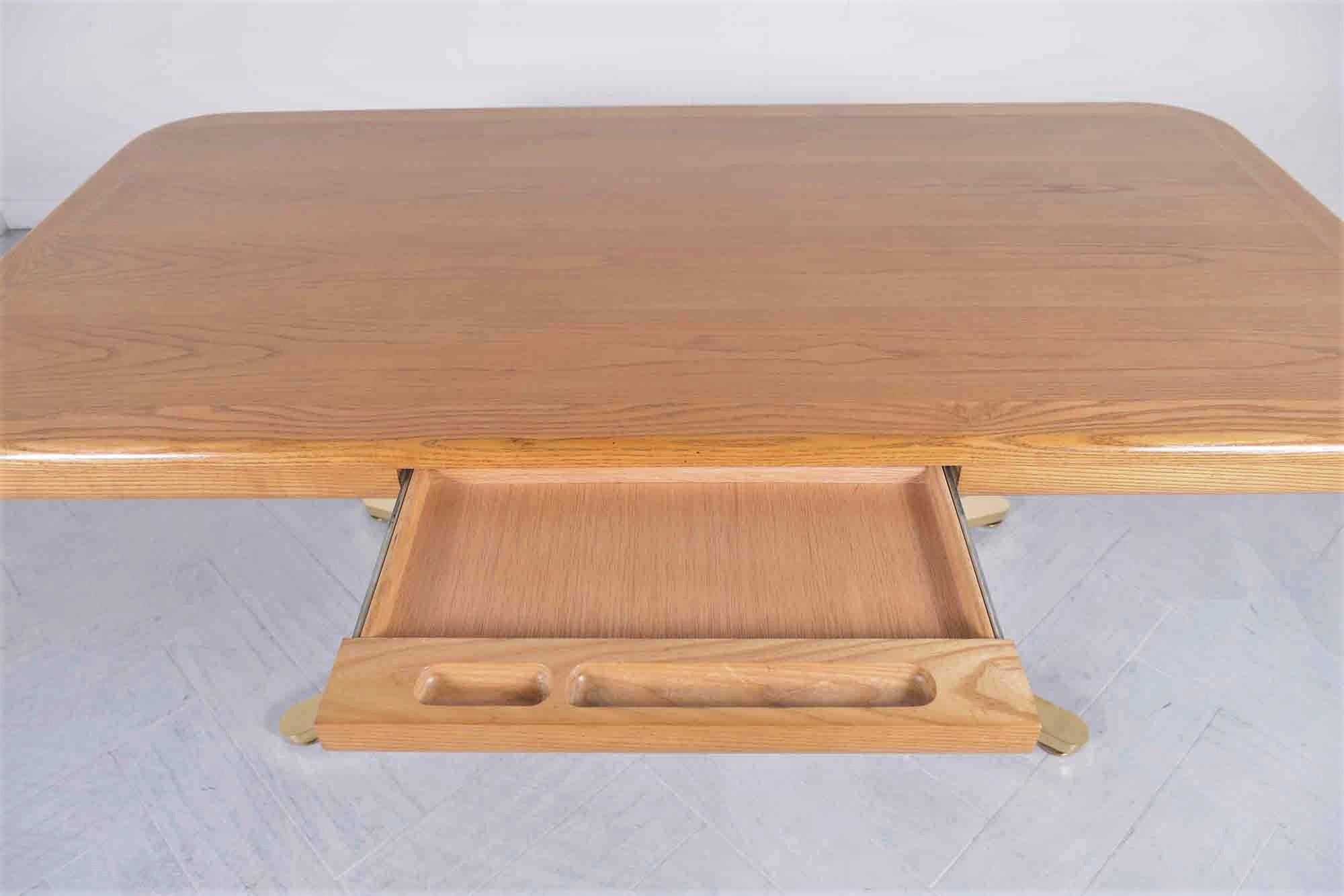 Restored 1960s Mid-Century Modern Oak and Brass Executive Desk In Good Condition For Sale In Los Angeles, CA