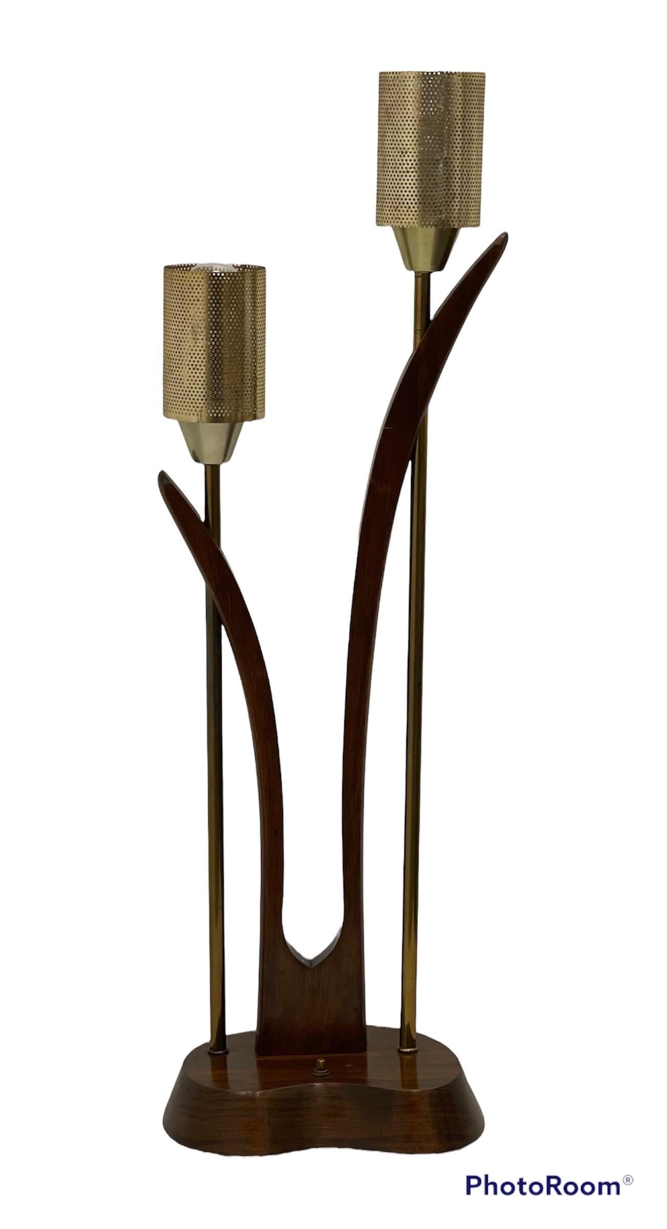 Vintage Mid-Century Modern lamp

Dimensions. 10 W ; 31 H ; 8 D.