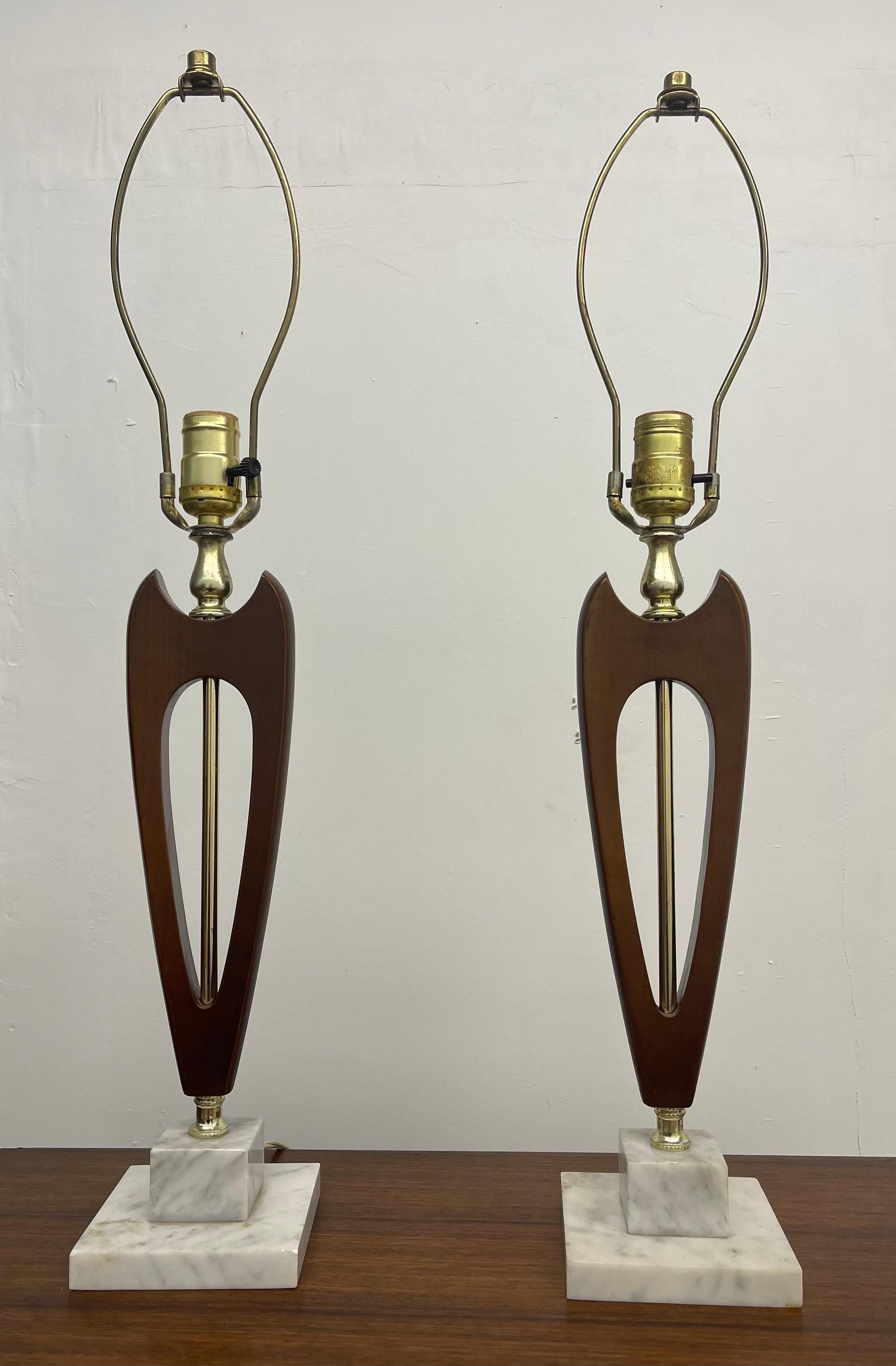 Vintage Mid-Century Modern lamps set of 2

Dimensions. Approx 4 1/2 W ; 26 H ; 4 1/2 D.