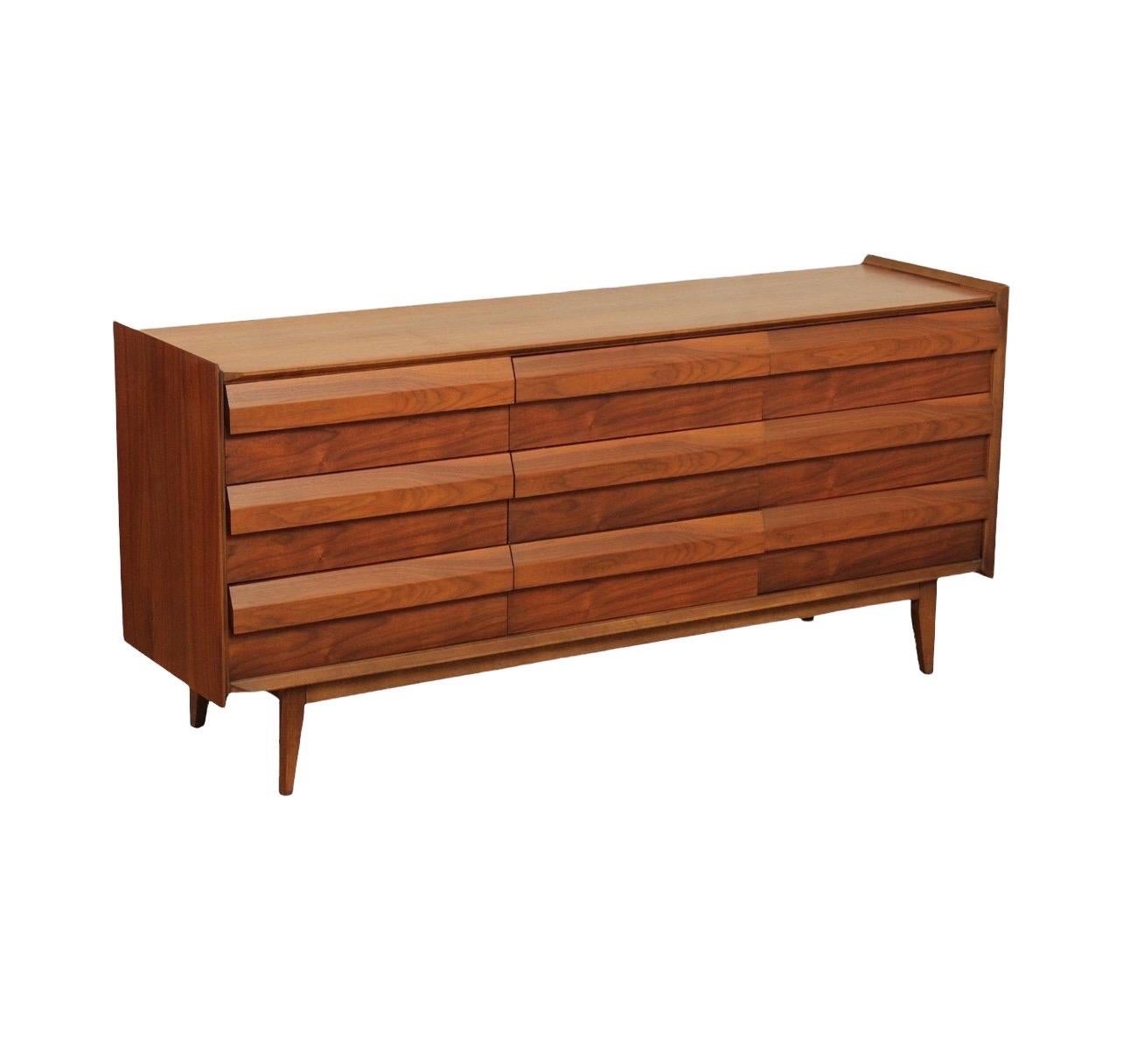 We have a beautiful mid-century dresser set available. The set has clean-lines and looks very sophisticated. 
 
 The set includes a lowboy and two endtables.

Lowboy dimensions: 66