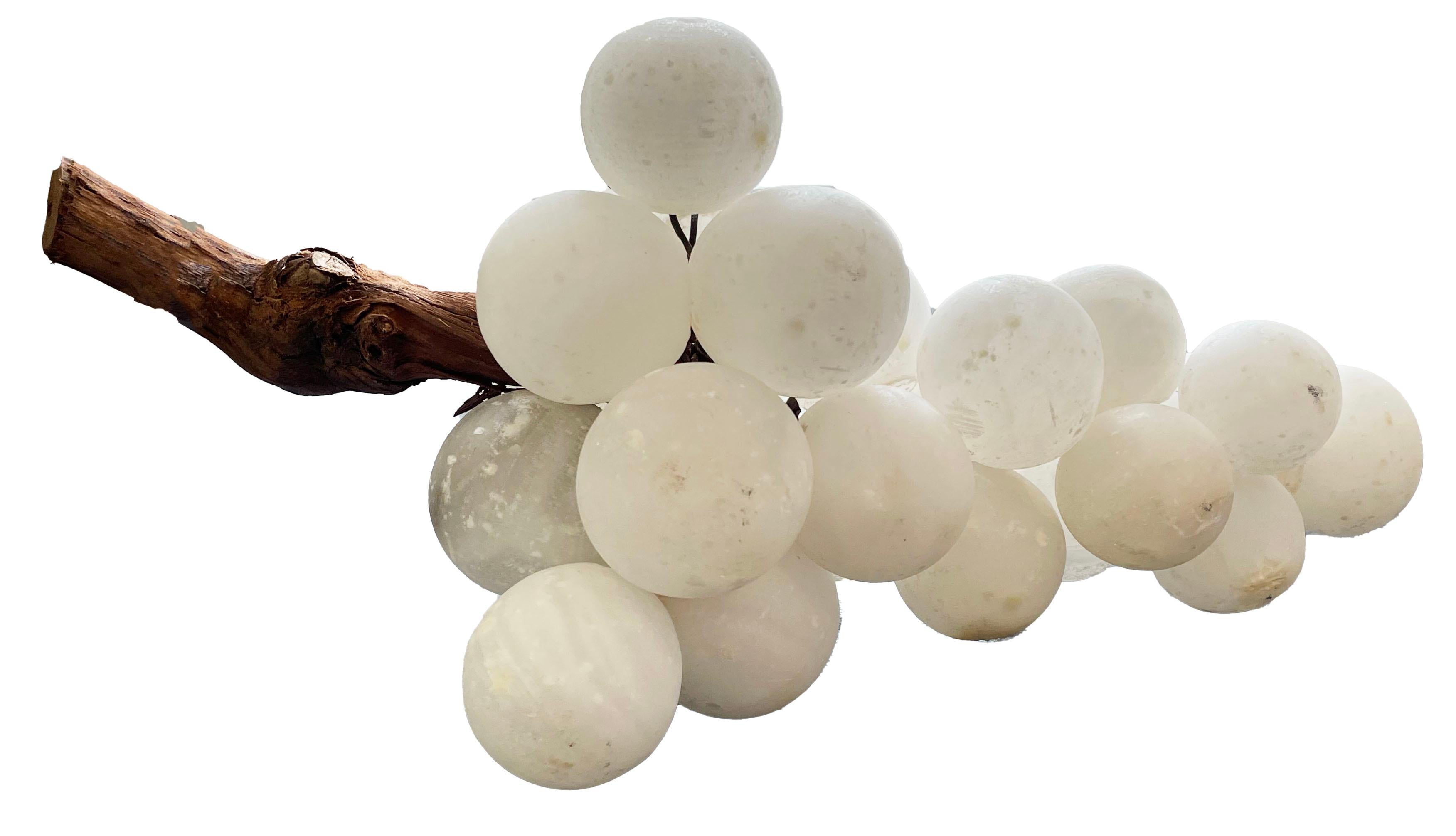 Beautiful vintage Mid-Century Modern Italian grape cluster made of alabaster. Natural stem. The varnish has been stripped off, removing the yellow color and allowing the original white alabaster to shine. a beautiful addition to any decor.