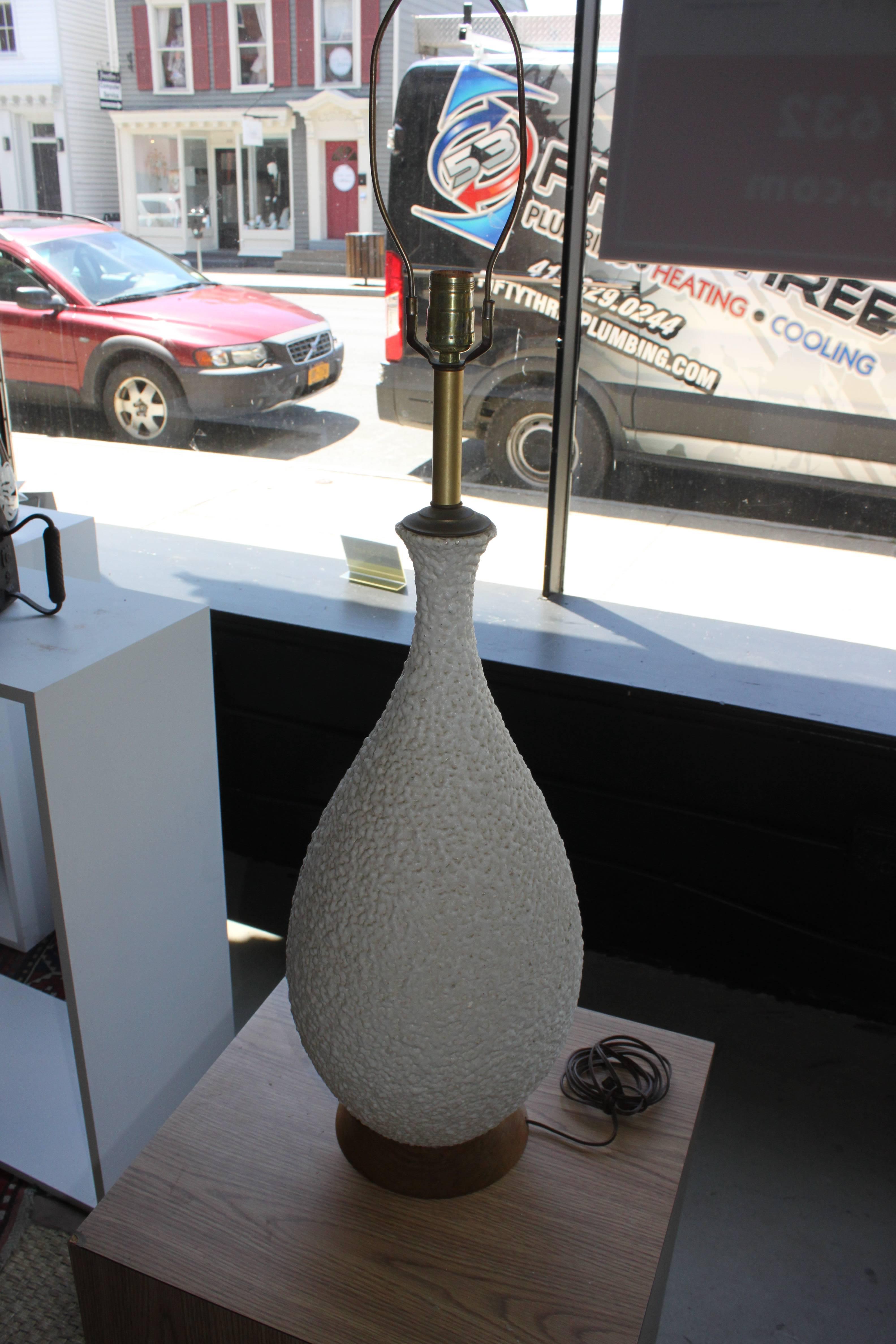 Ceramic lava texture lamp. Lamp shade is excluded with the sale. Height to the top of the ceramic is 25