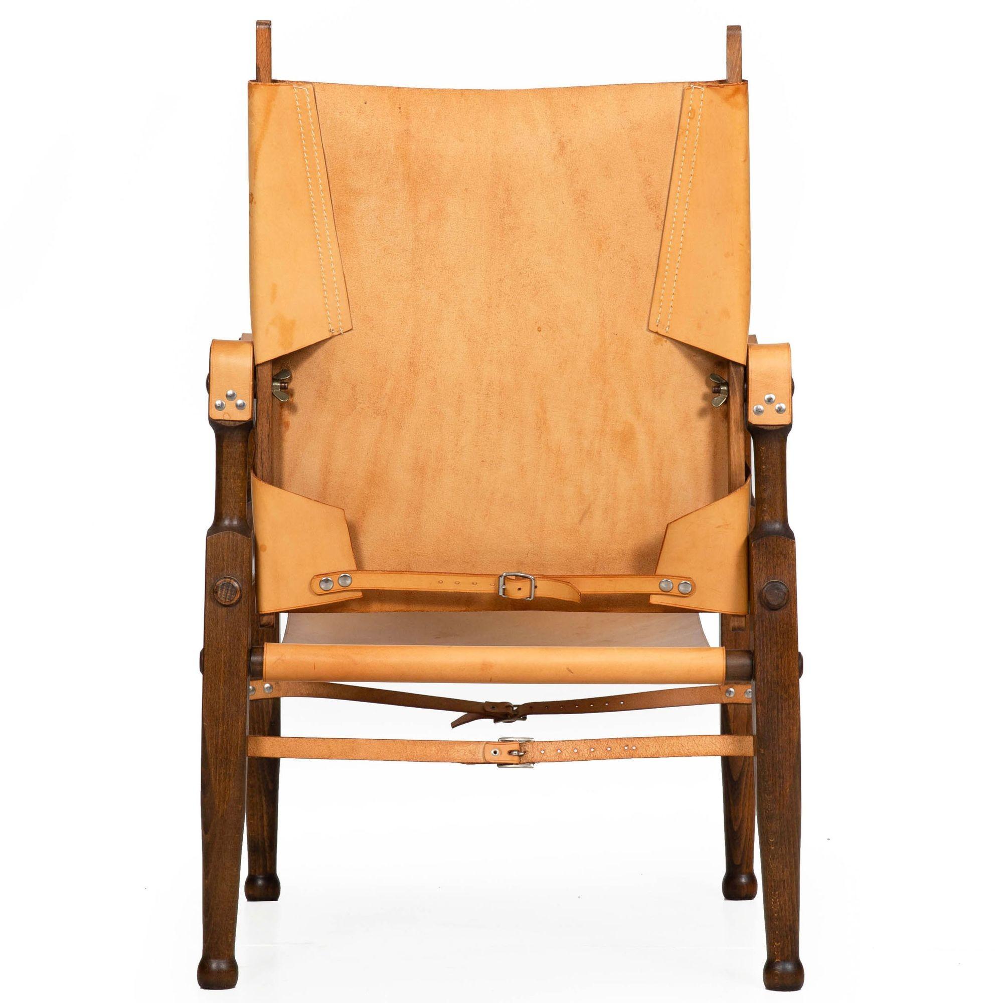 Vintage Mid Century Modern Leather “Safari” Chair after Wilhelm Kienzle In Good Condition For Sale In Shippensburg, PA